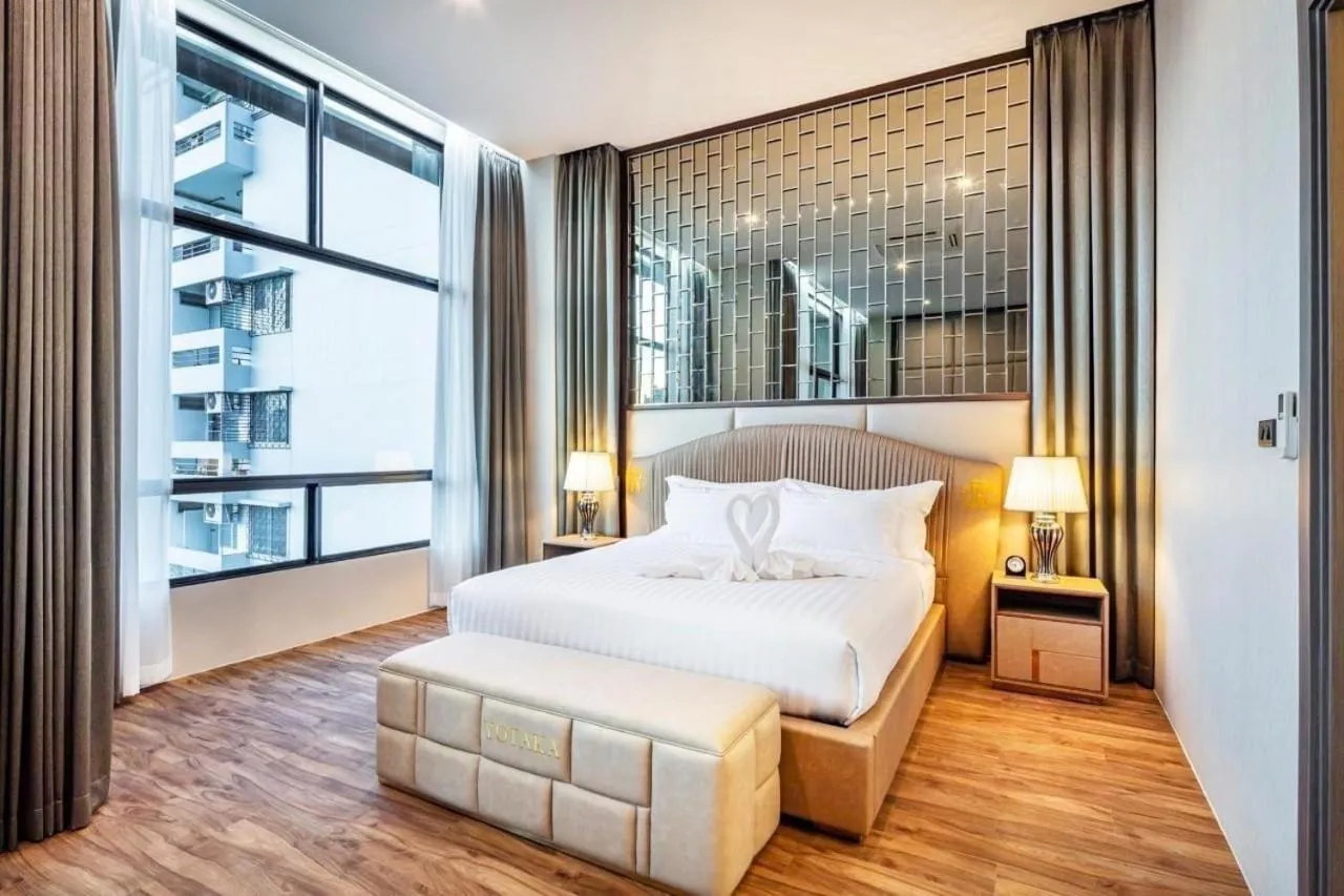 Bed in The Grand Sala Thai