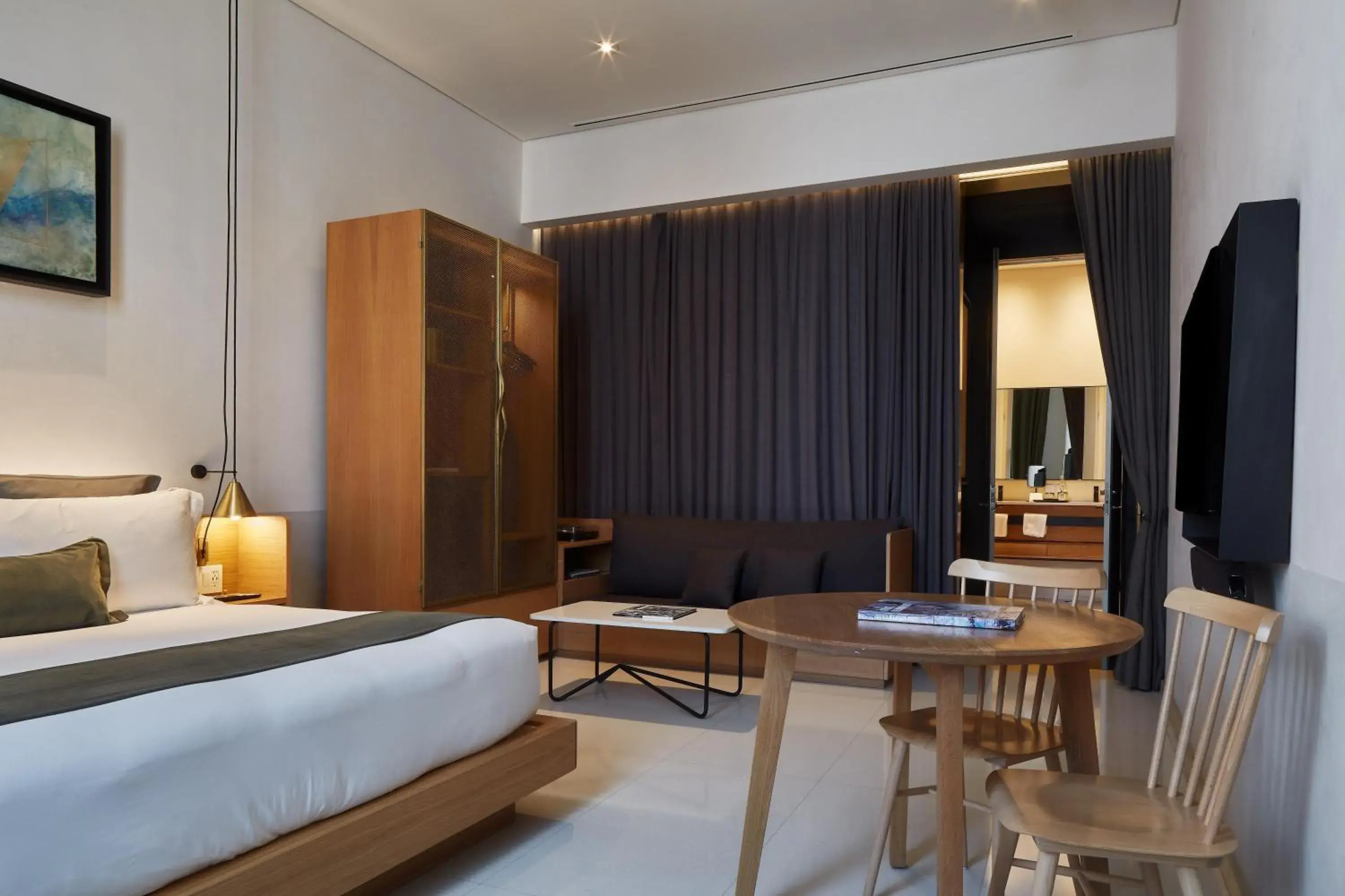 Living room, Bed in Umbral, Curio Collection By Hilton Living room, Bed in Umbral, Curio Collection By Hilton