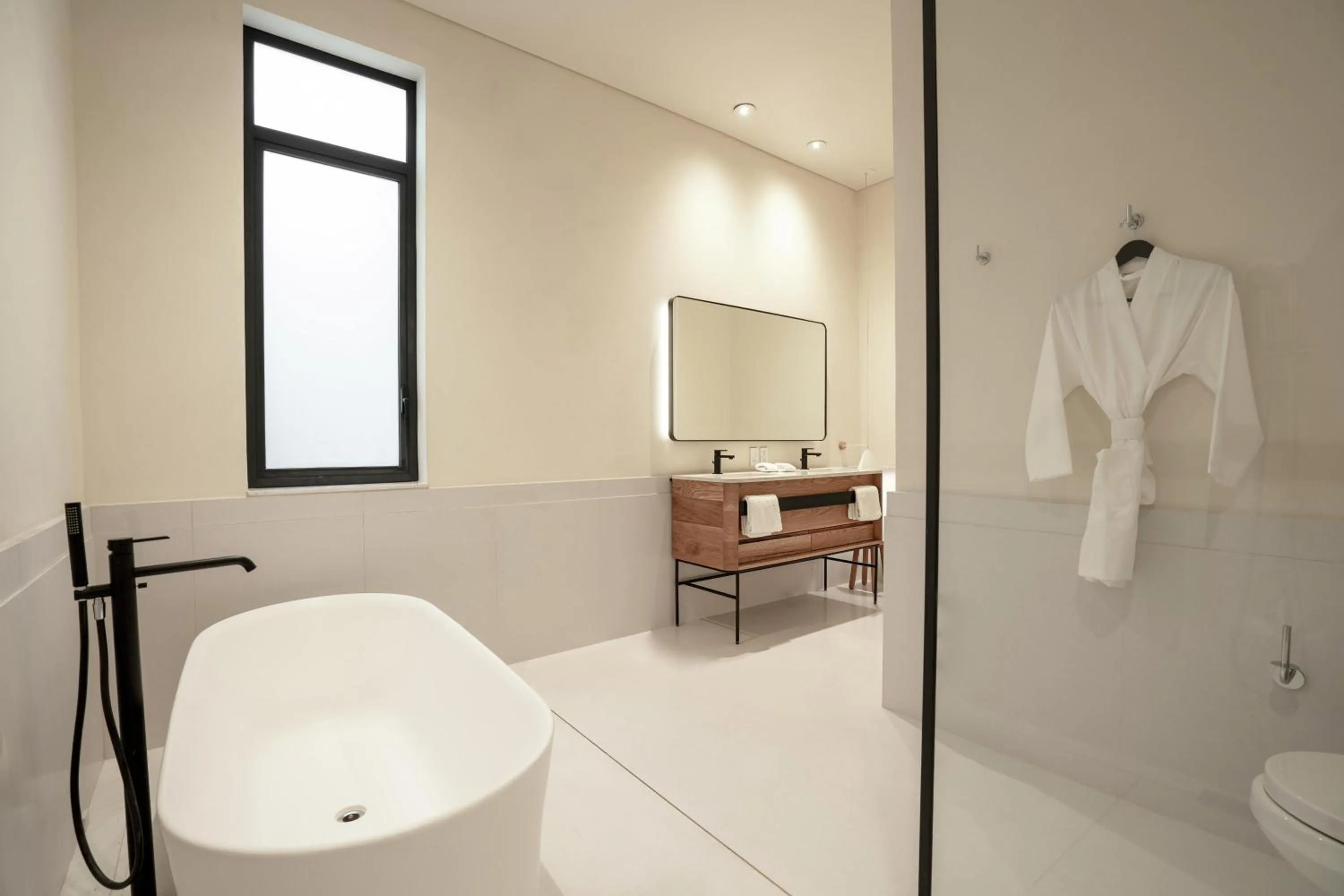 Bathroom in Umbral, Curio Collection By Hilton