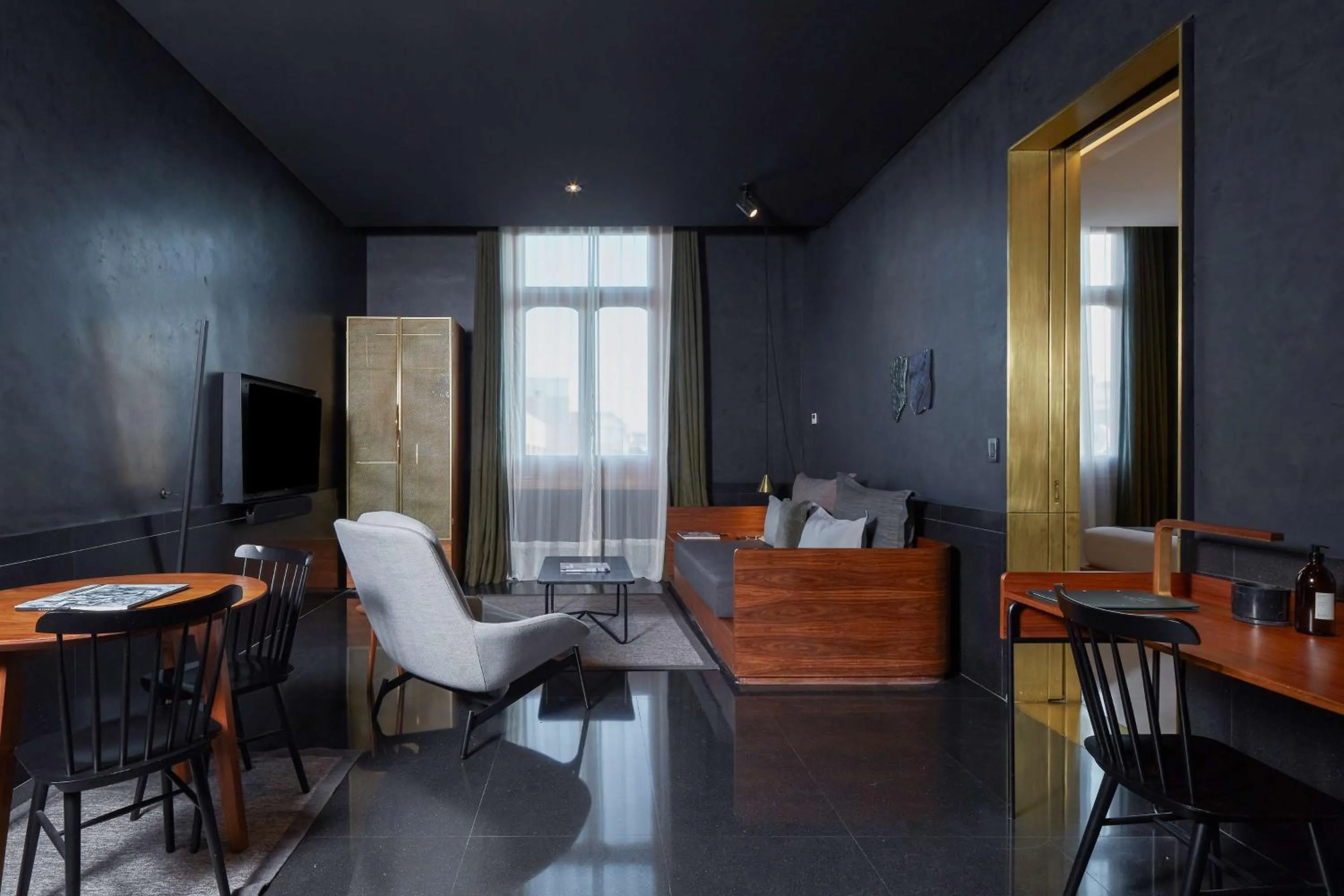 Living room in Umbral, Curio Collection By Hilton