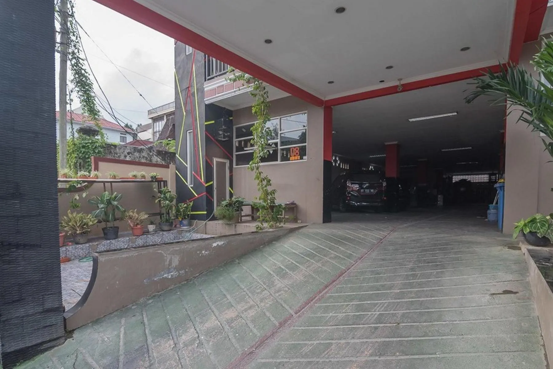 Property logo or sign in RedDoorz near E Walk Mall Balikpapan