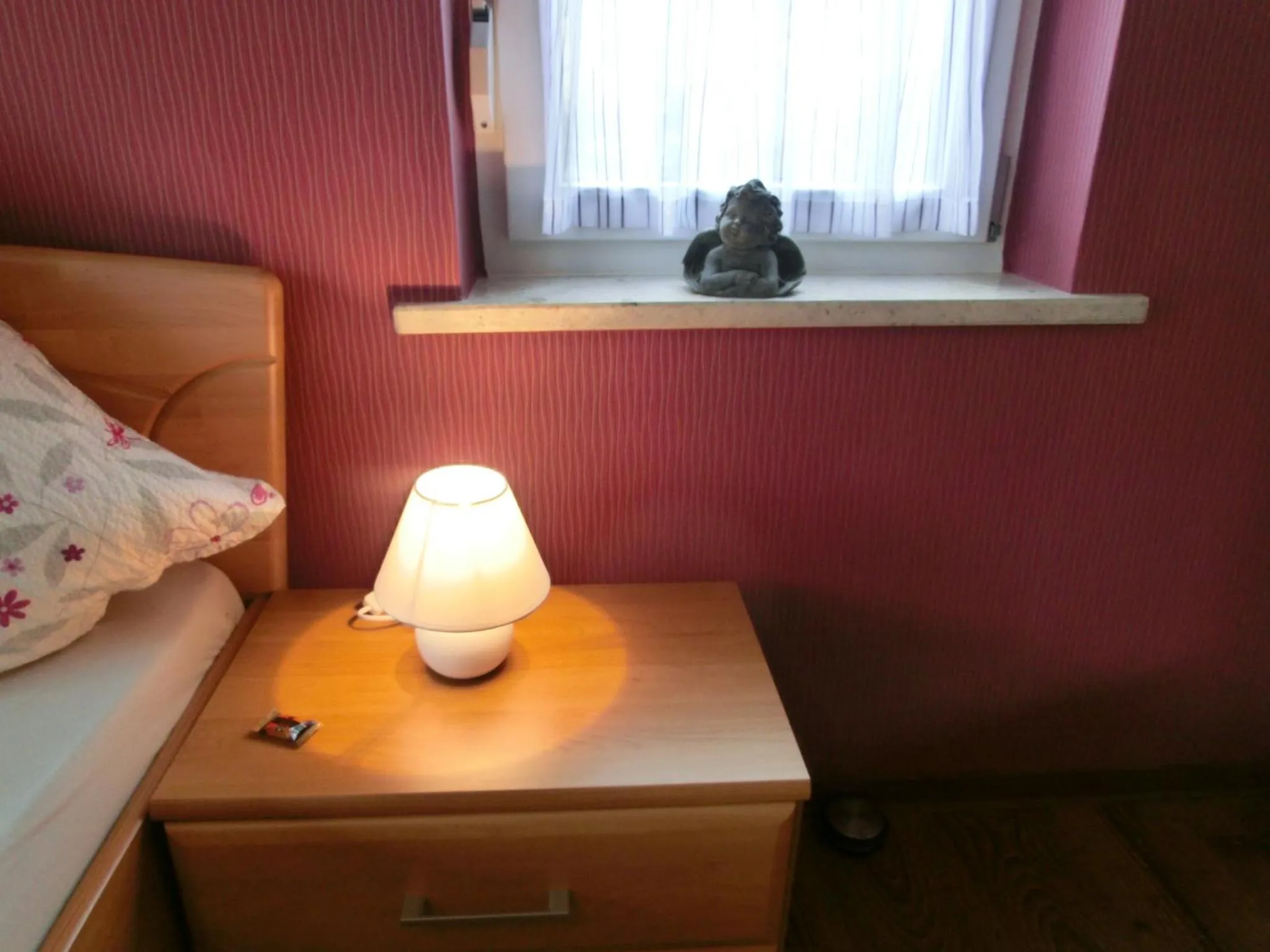 Decorative detail, Bed in Ferienweingut Hirschen Schulstraße