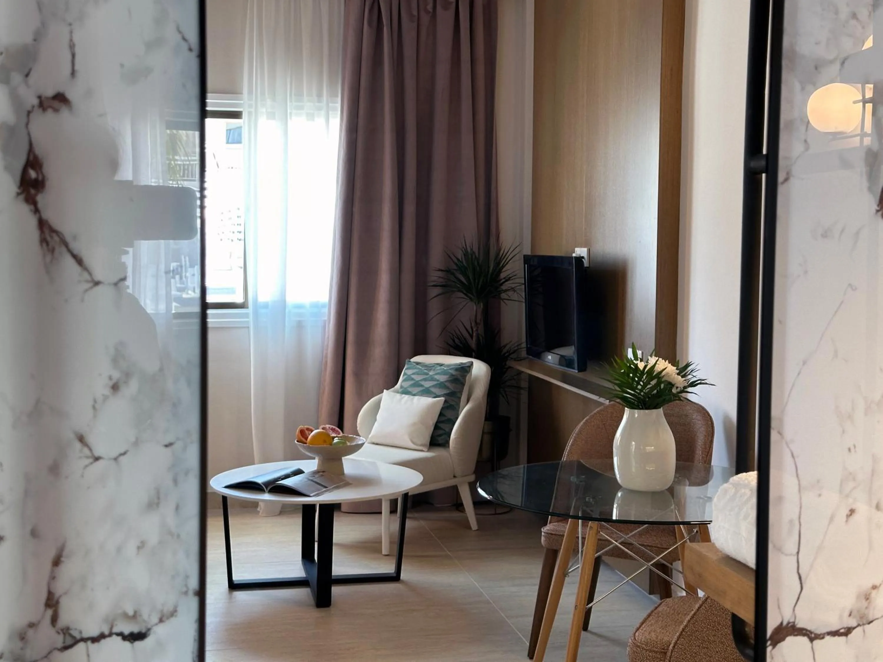 Seating area in King Jason Paphos - Designed for Adults by Louis Hotels