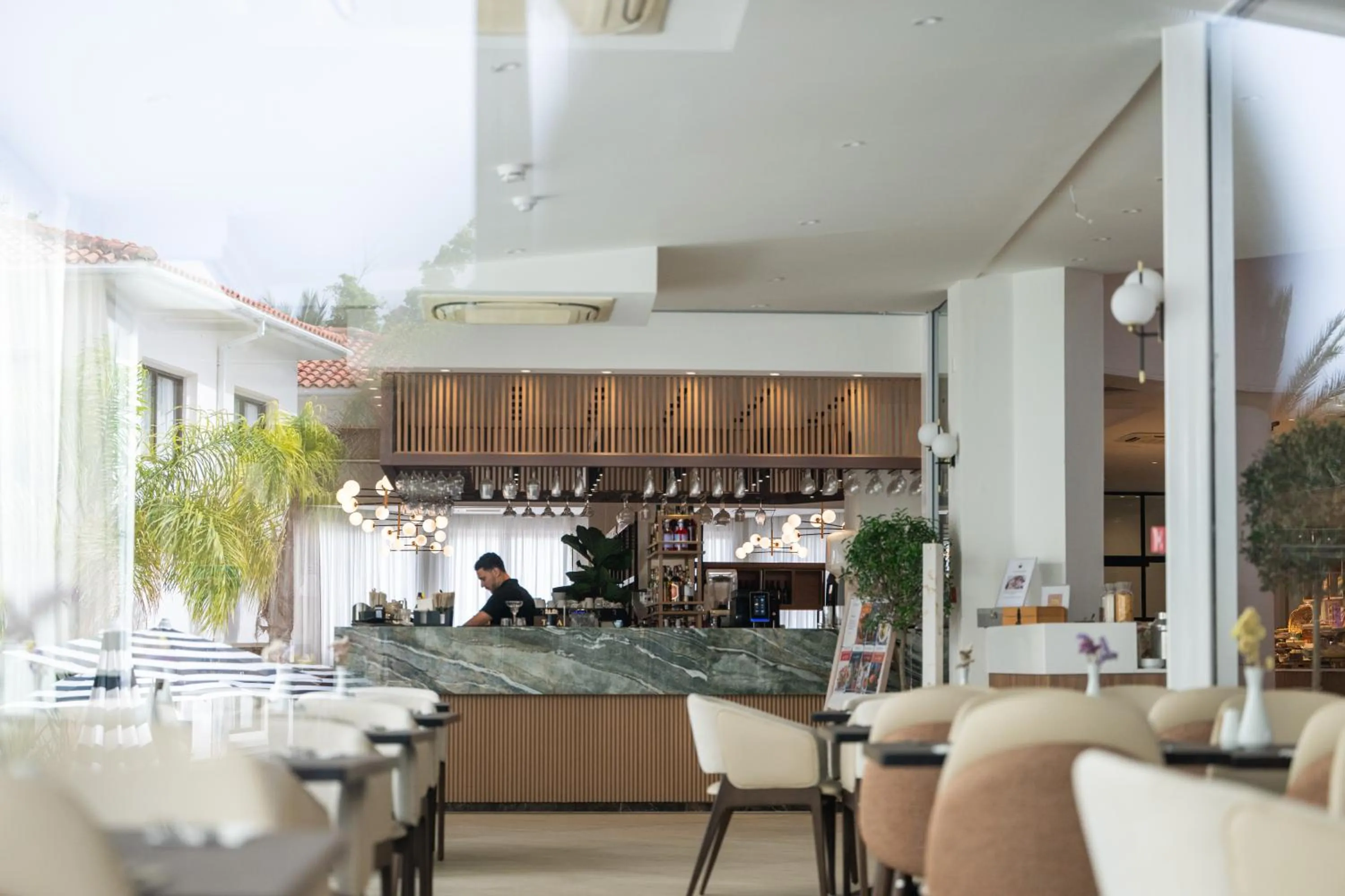 Lounge or bar in King Jason Paphos - Designed for Adults by Louis Hotels