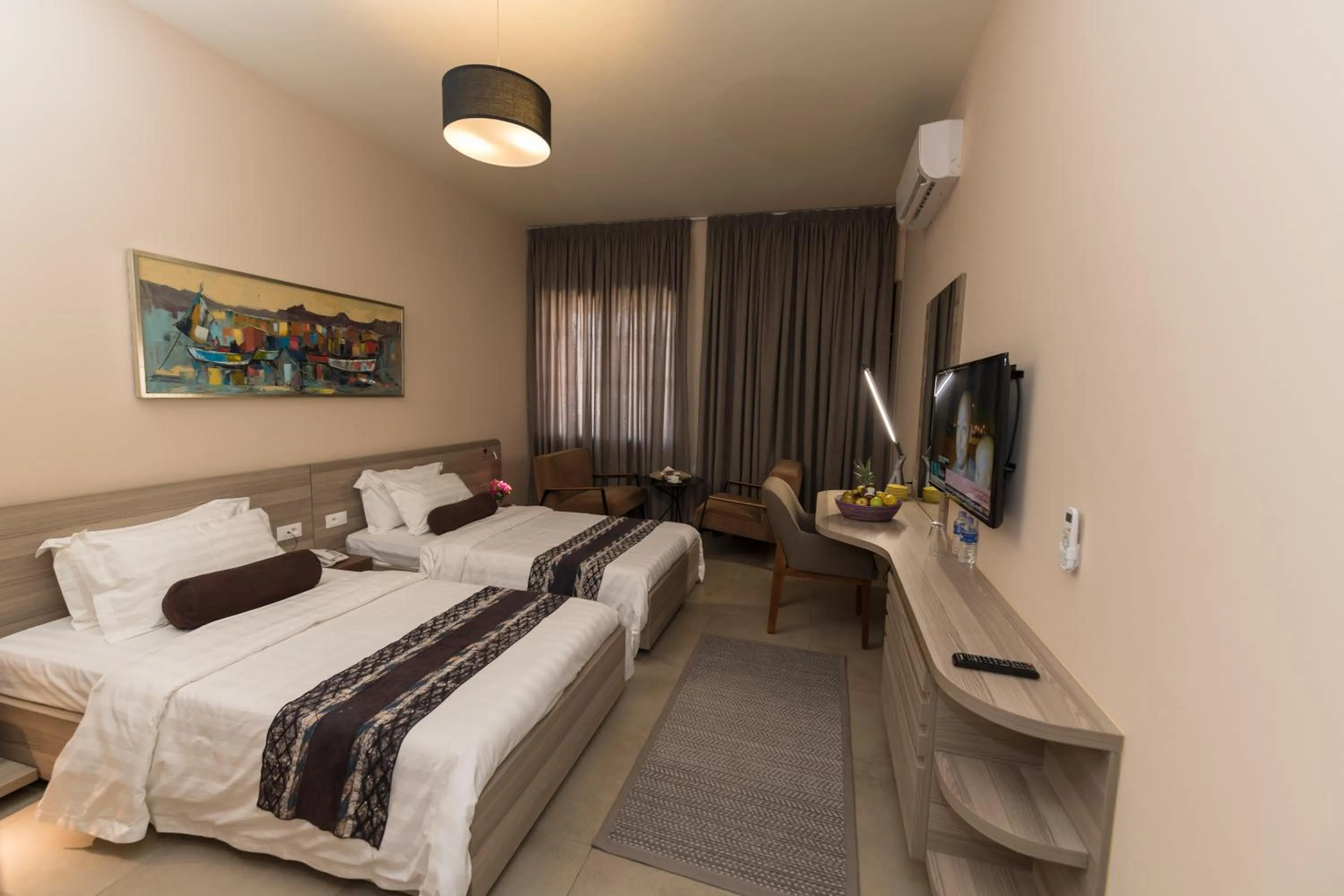 Bed in Roots Hotel Apartments Abidjan