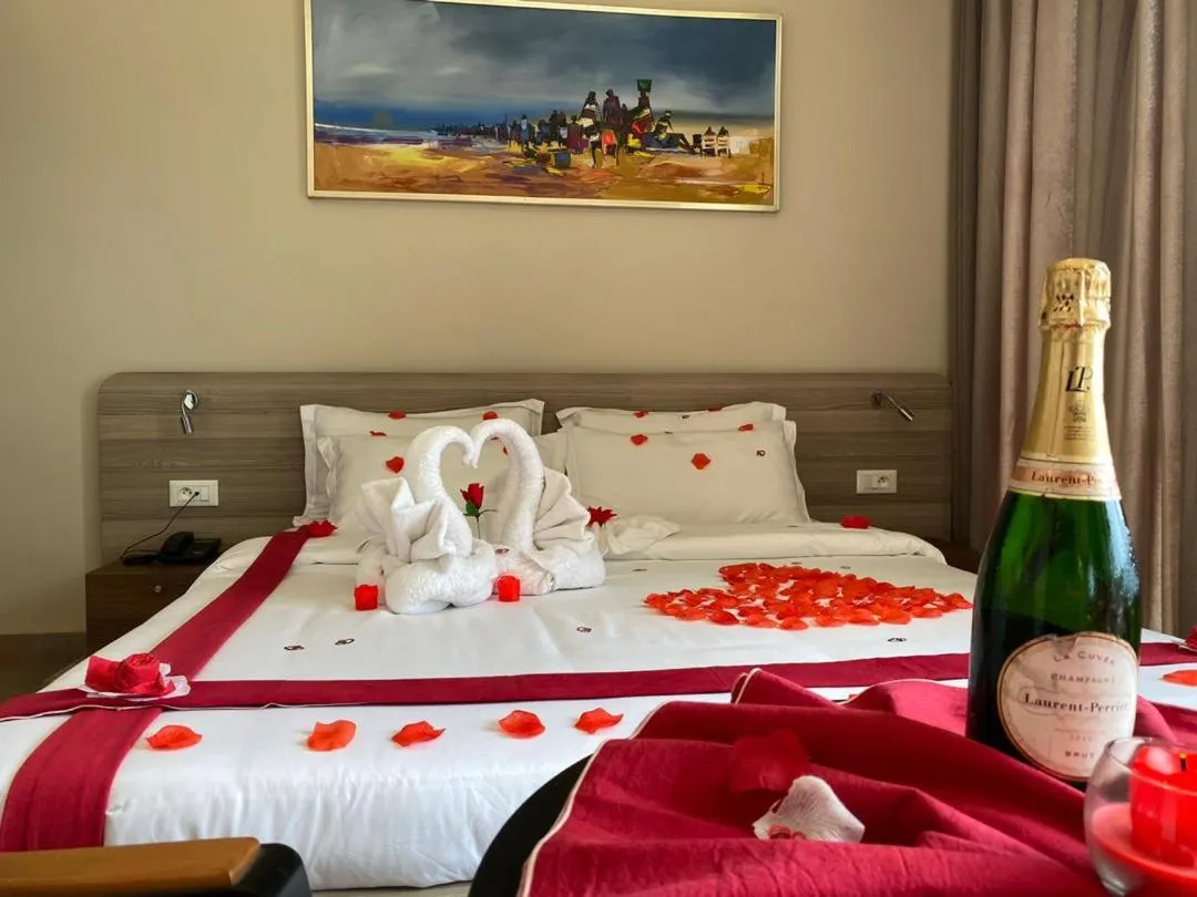 Bed in Roots Hotel Apartments Abidjan