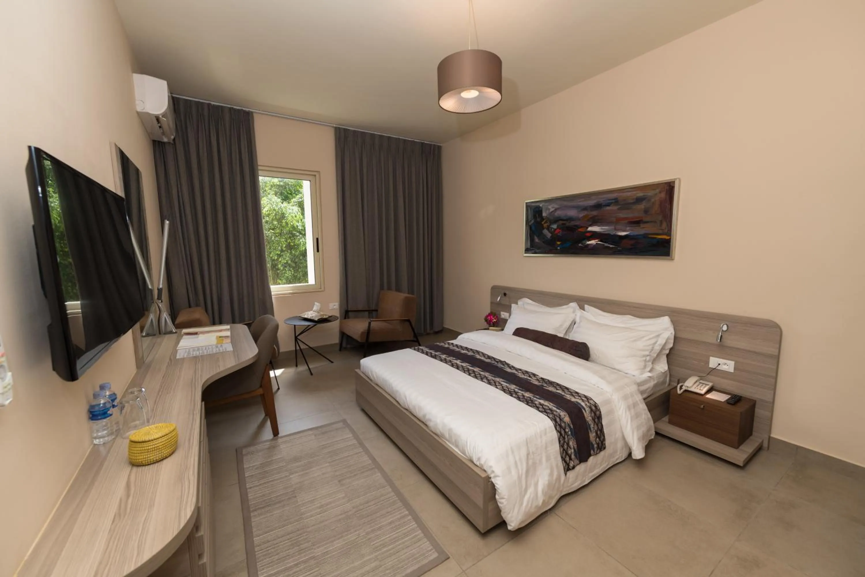 Bed in Roots Hotel Apartments Abidjan