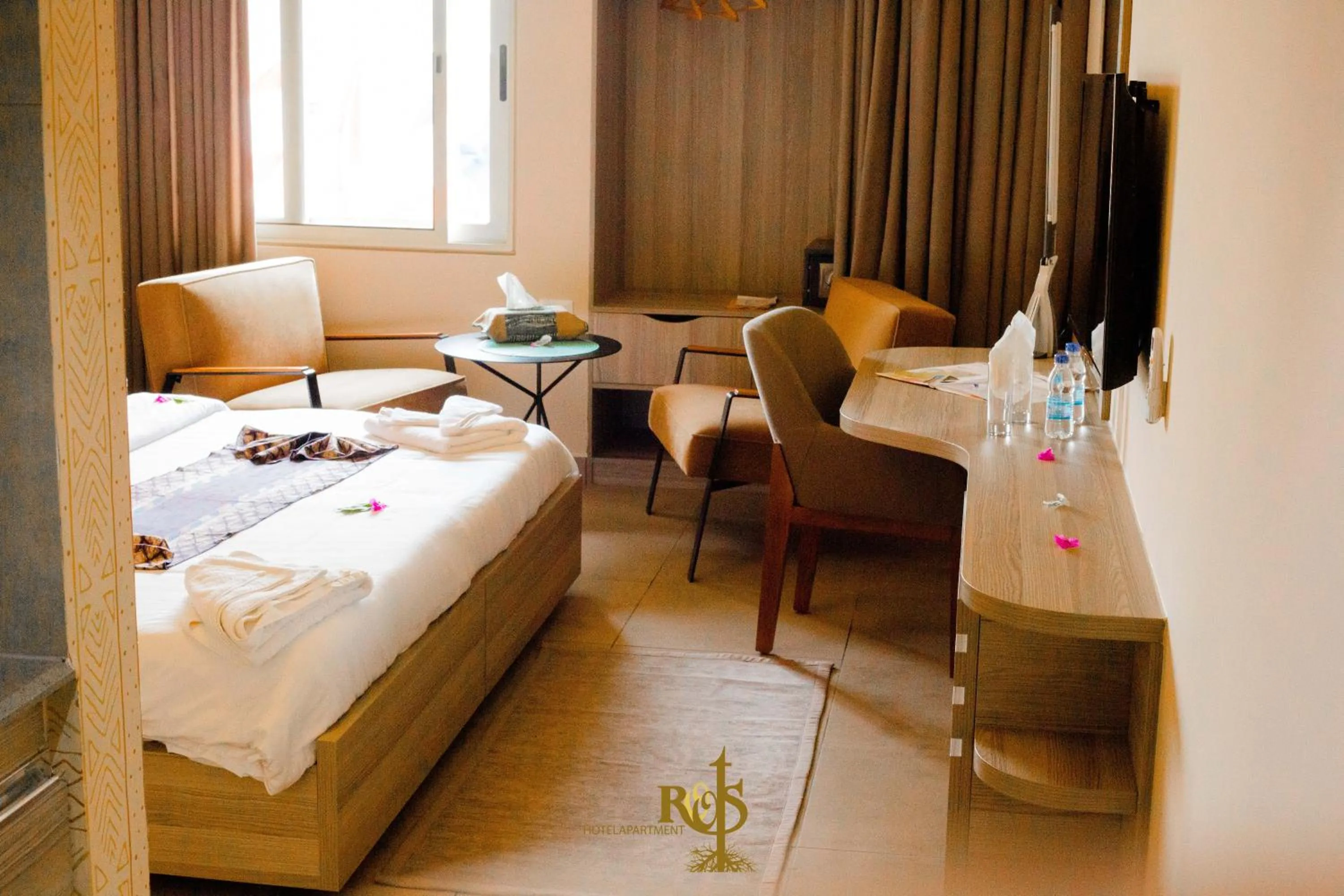 Bed in Roots Hotel Apartments Abidjan