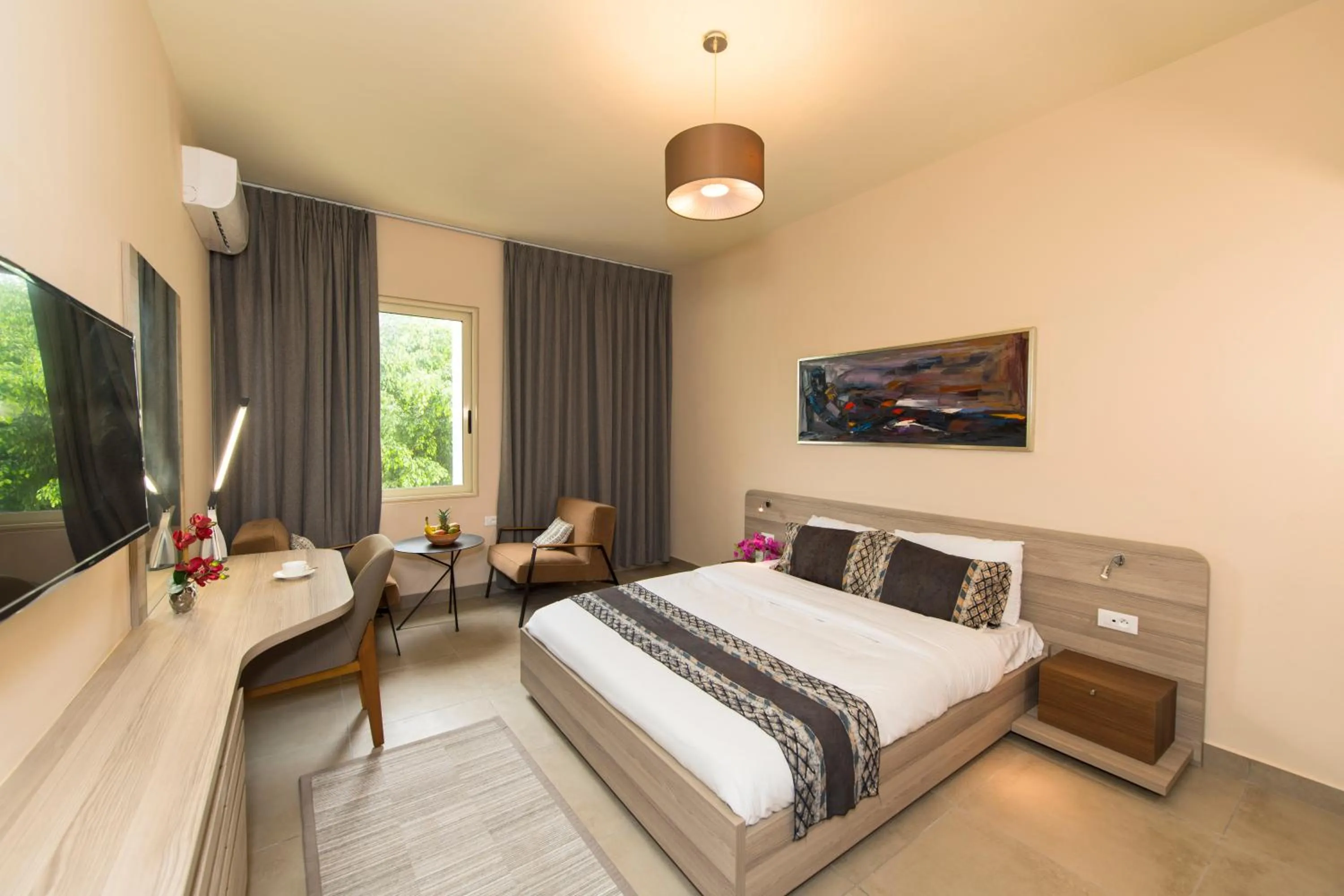 Bed in Roots Hotel Apartments Abidjan