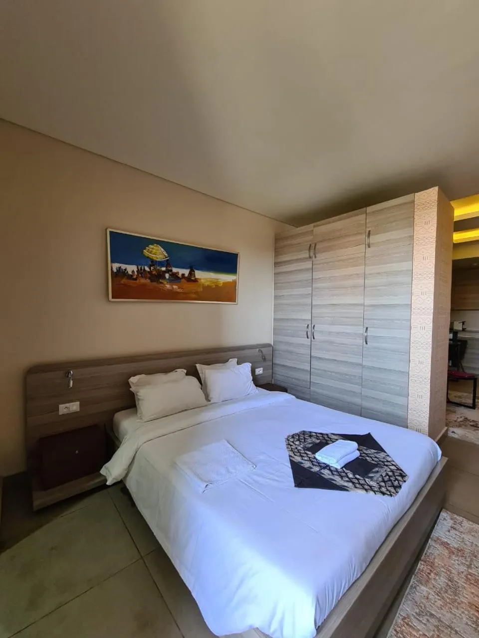 Bed in Roots Hotel Apartments Abidjan