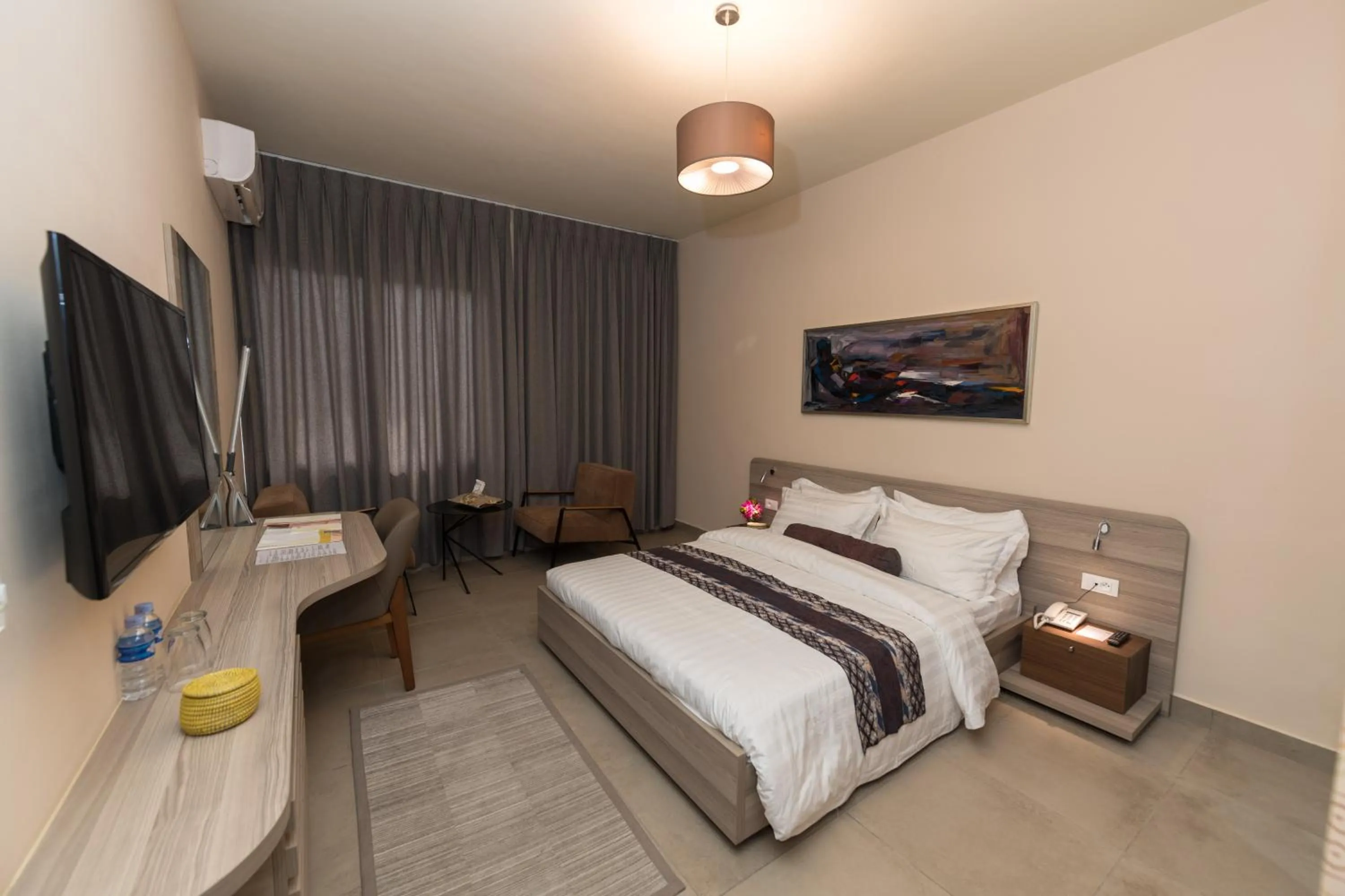 Bed in Roots Hotel Apartments Abidjan