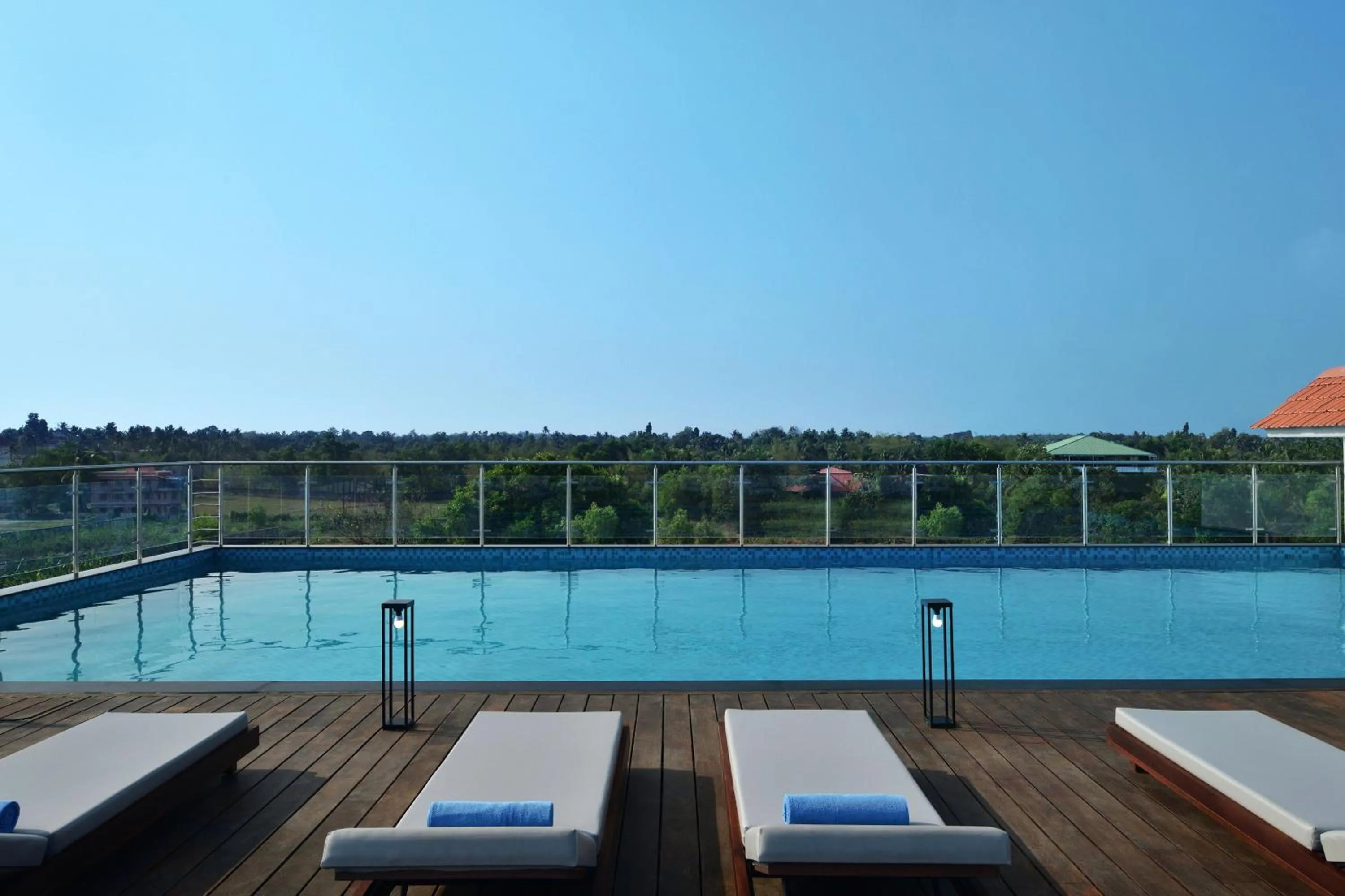 Swimming pool in Port Muziris, A Tribute Portfolio Hotel by Marriott