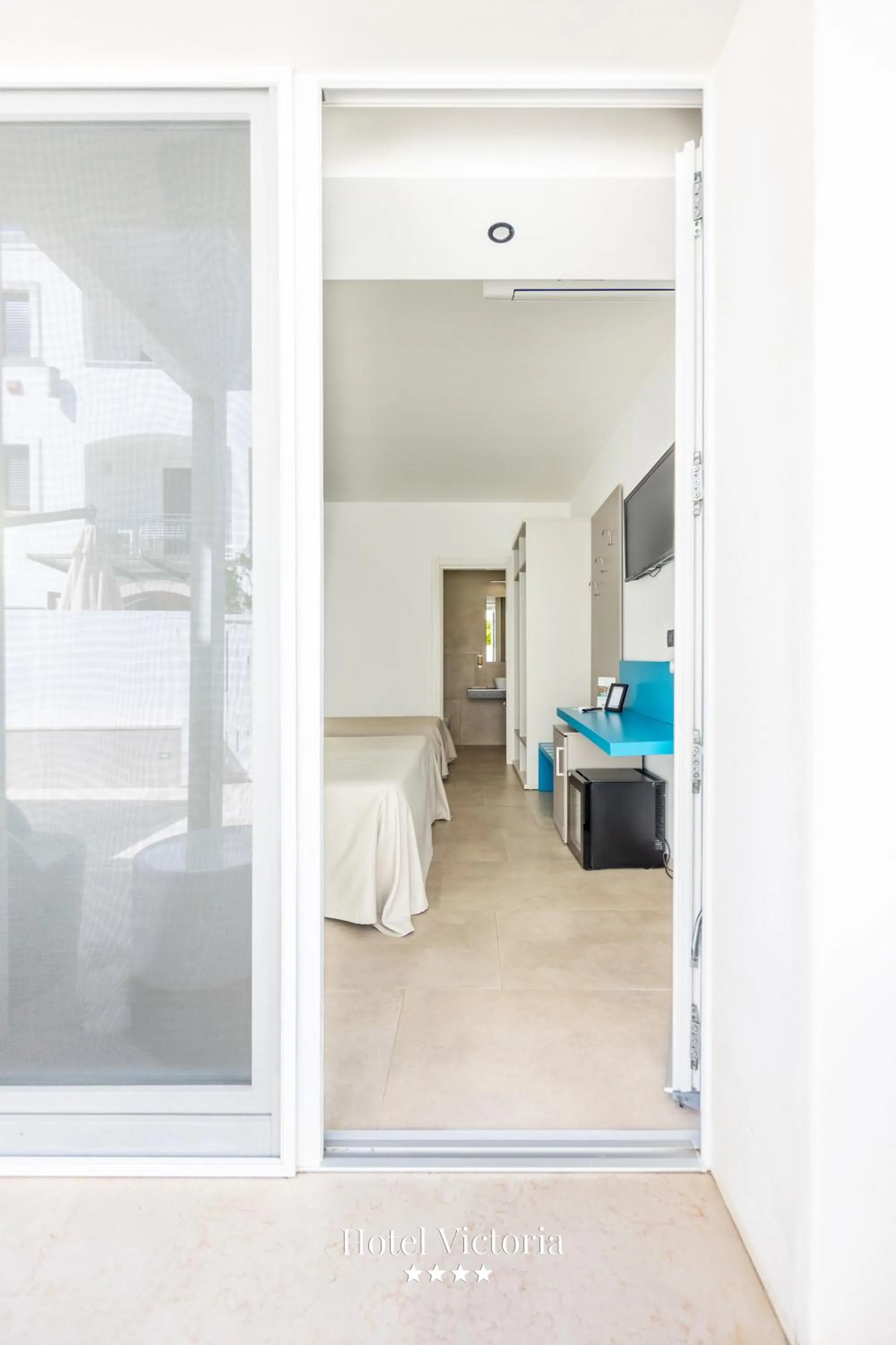 Patio, Bed in Hotel Victoria