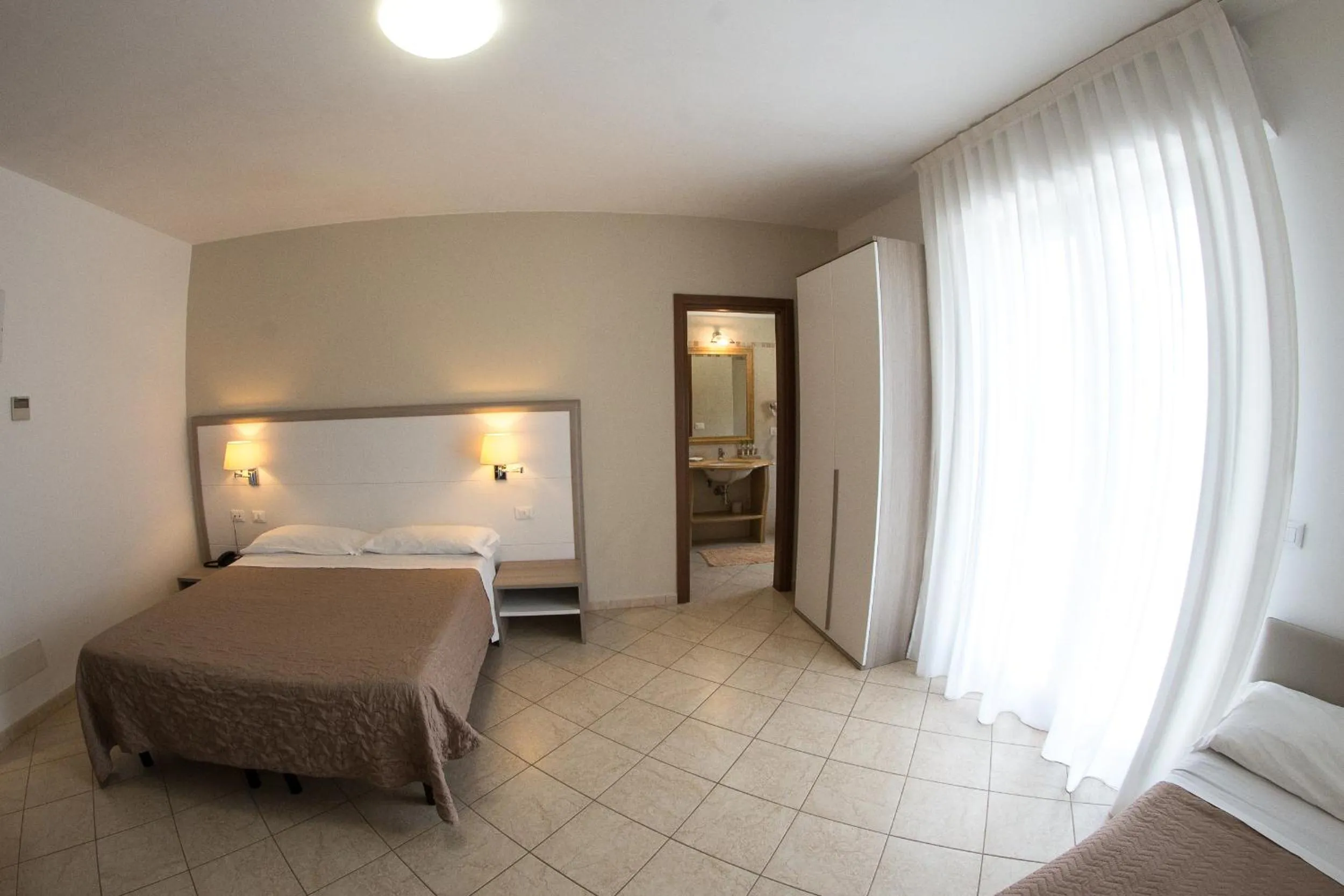 Bed in Hotel Victoria