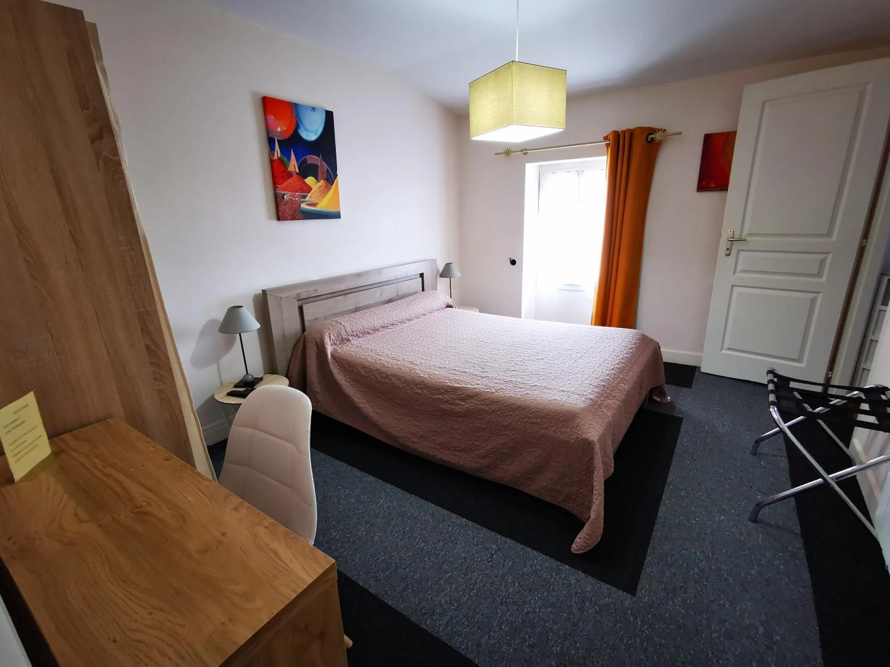 Bed in Logis Hôtel & Restaurant Le Saint Savinien