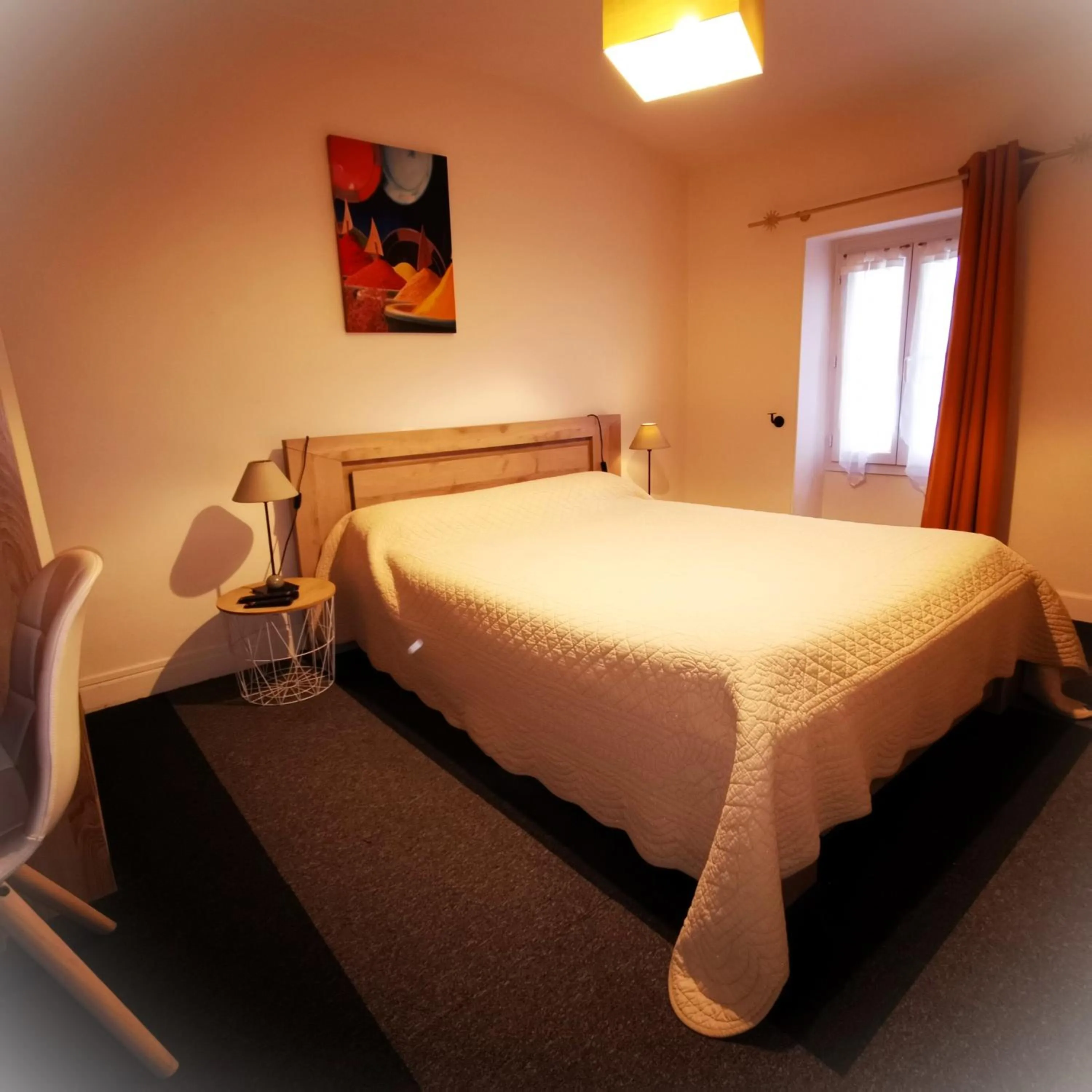 Bed in Logis Hôtel & Restaurant Le Saint Savinien