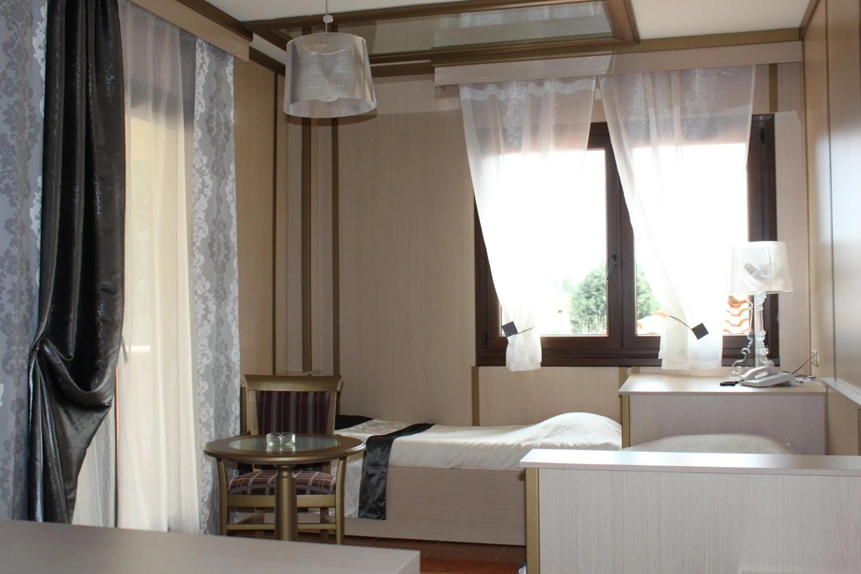 Photo of the whole room, Bed in Chris & Eve Mansion
