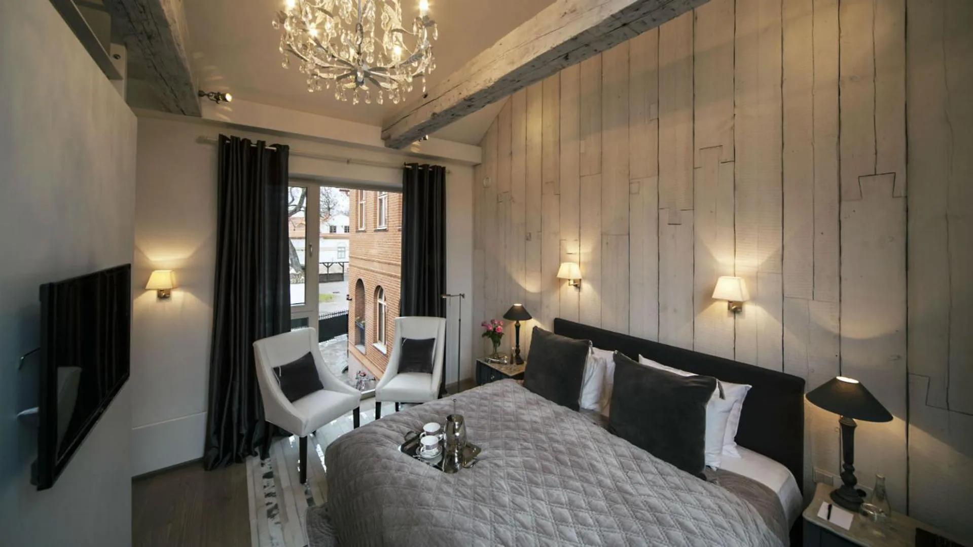 Photo of the whole room, Bed in Frost Boutique Hotel