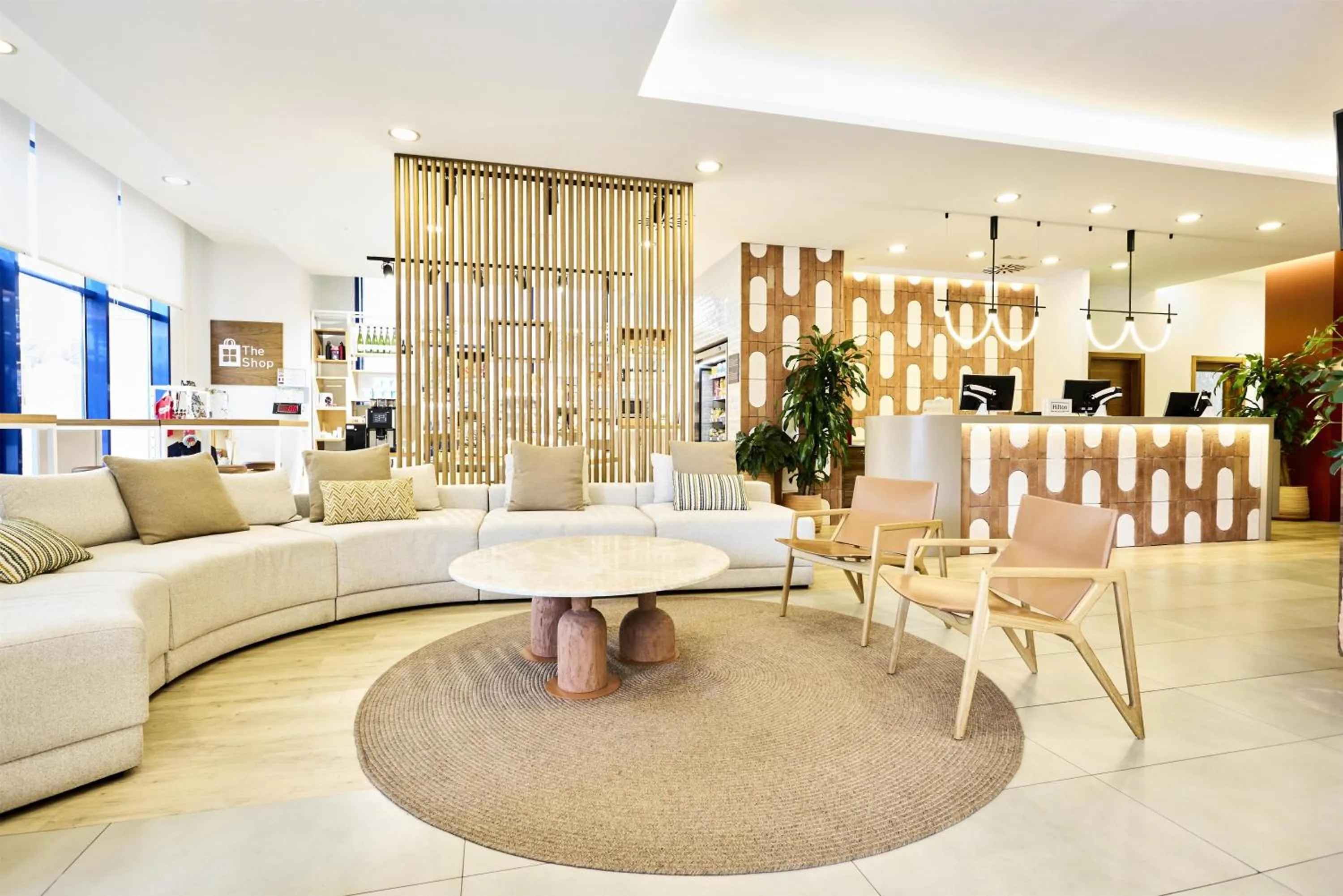 Lobby or reception in Hilton Garden Inn Sevilla