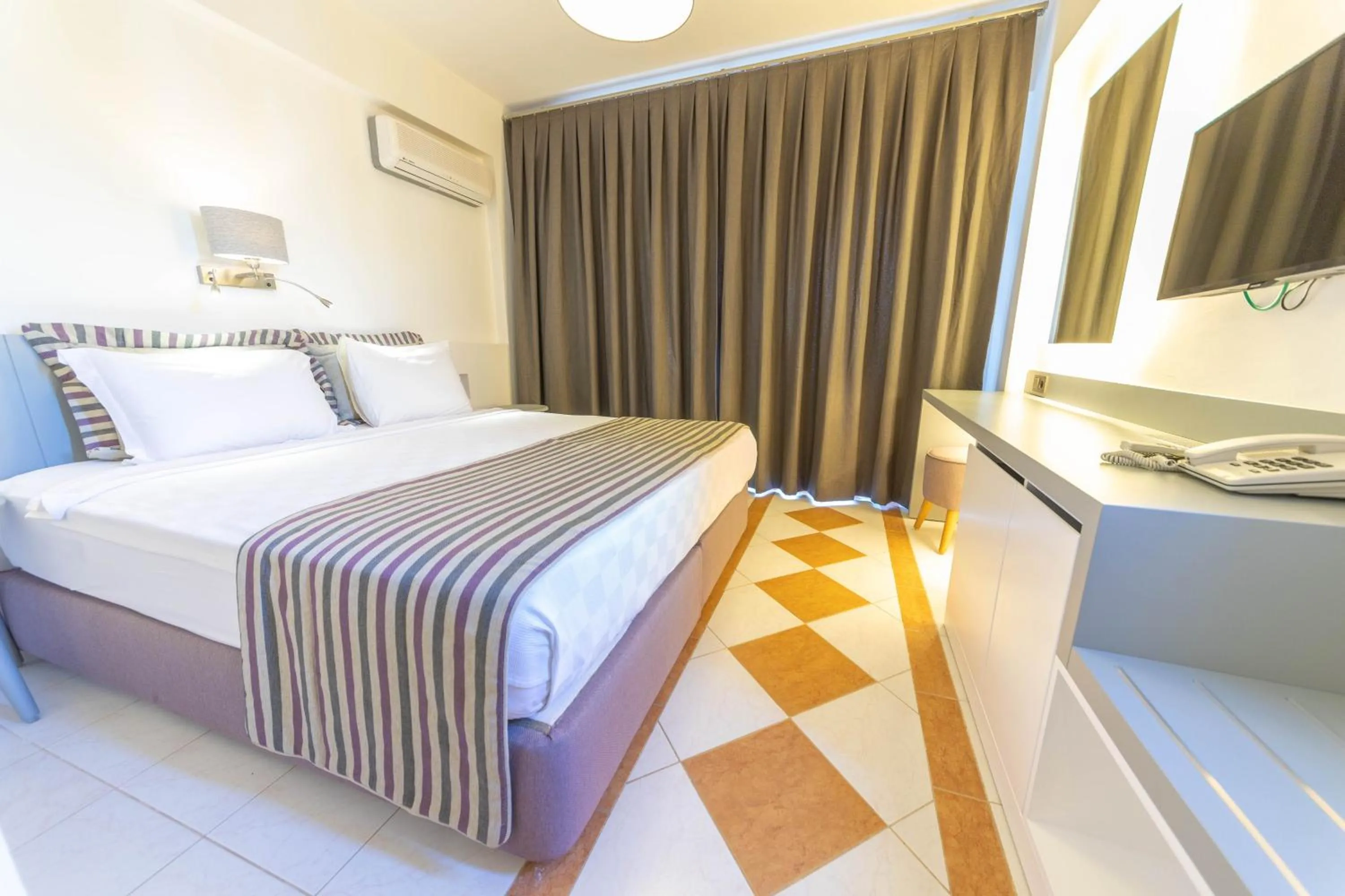 Bed in Arinnanda Hotel Cesme