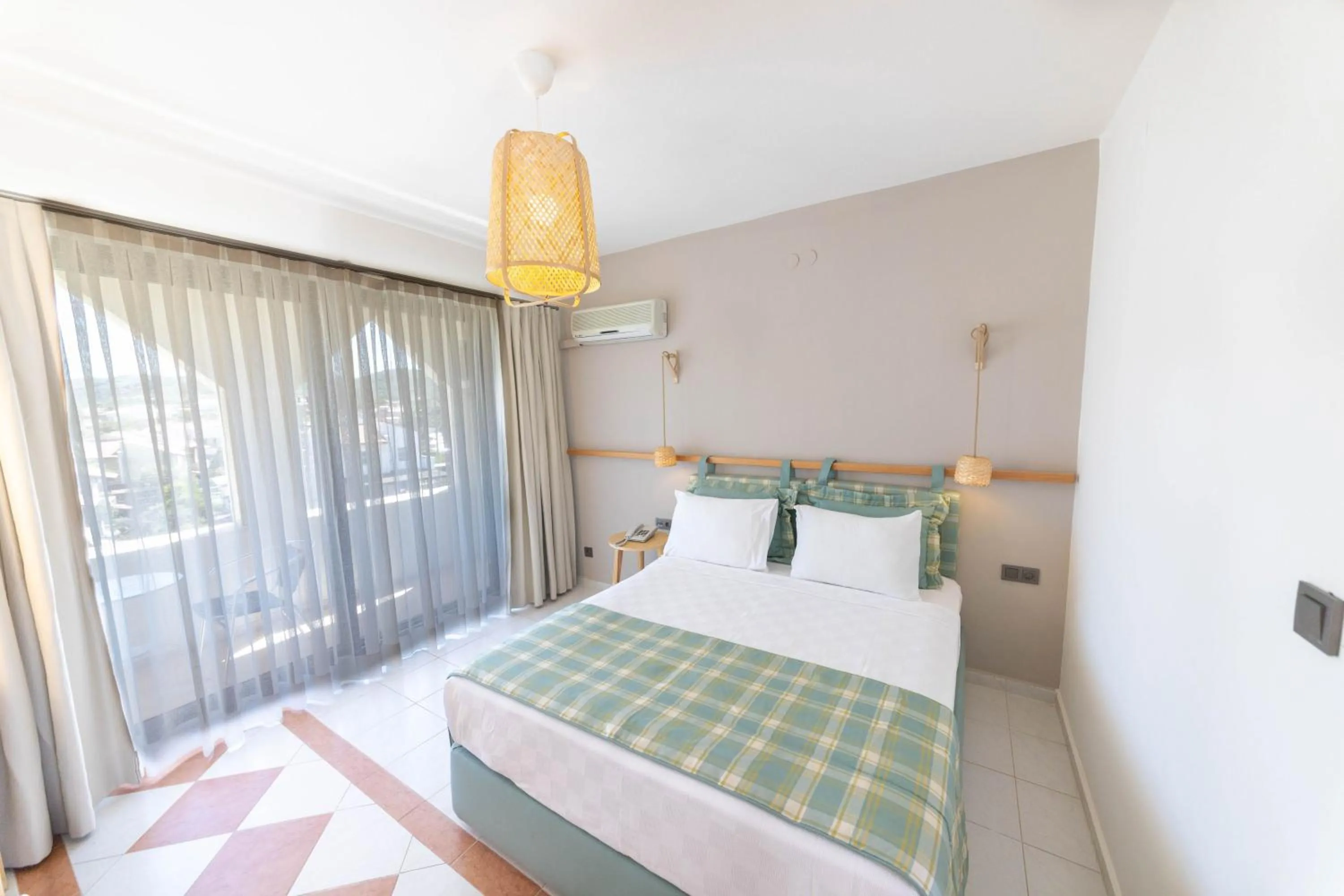 Photo of the whole room, Bed in Arinnanda Hotel Cesme