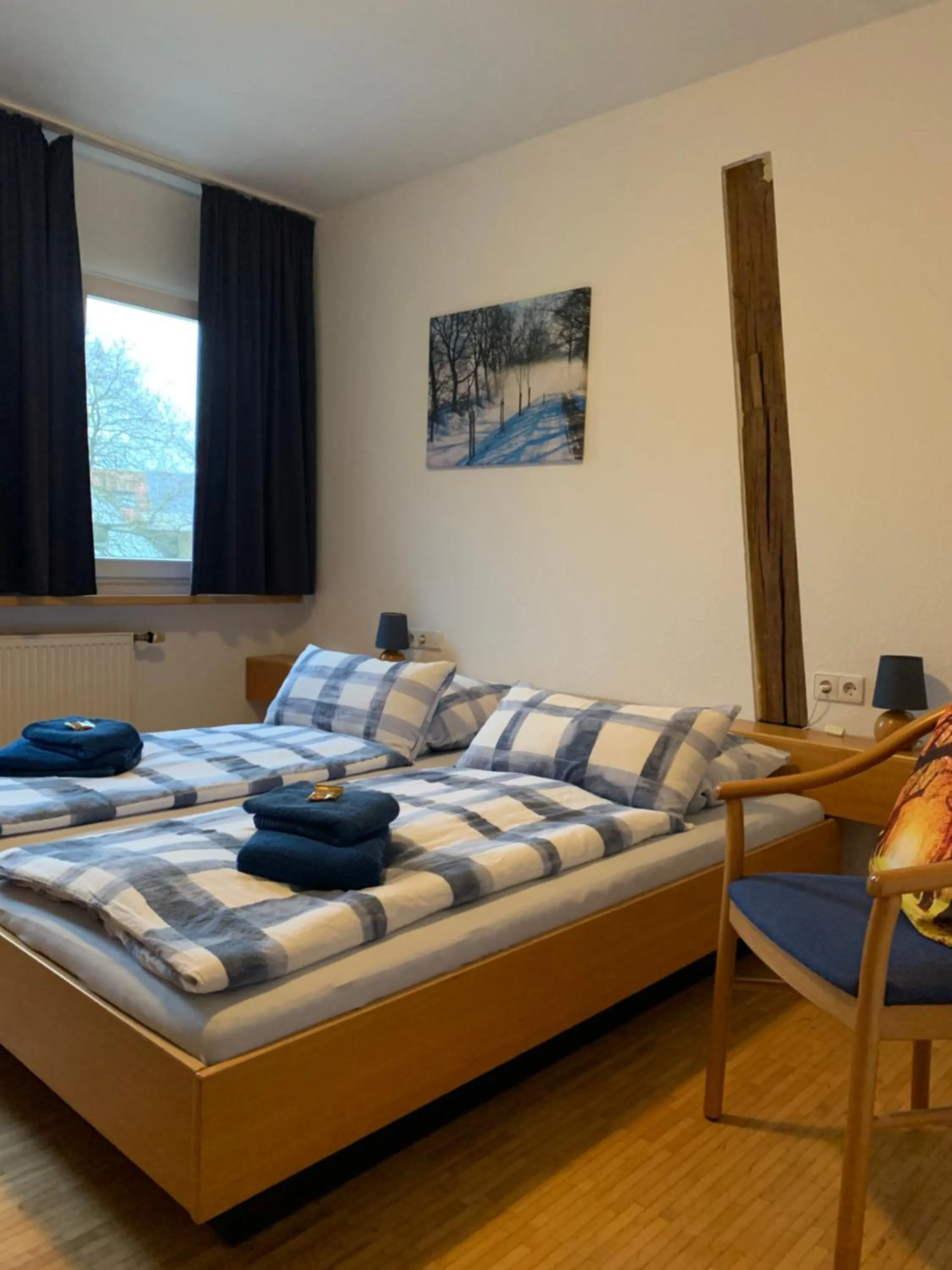 Photo of the whole room, Bed in Landgasthaus-Hotel Wenninghoff