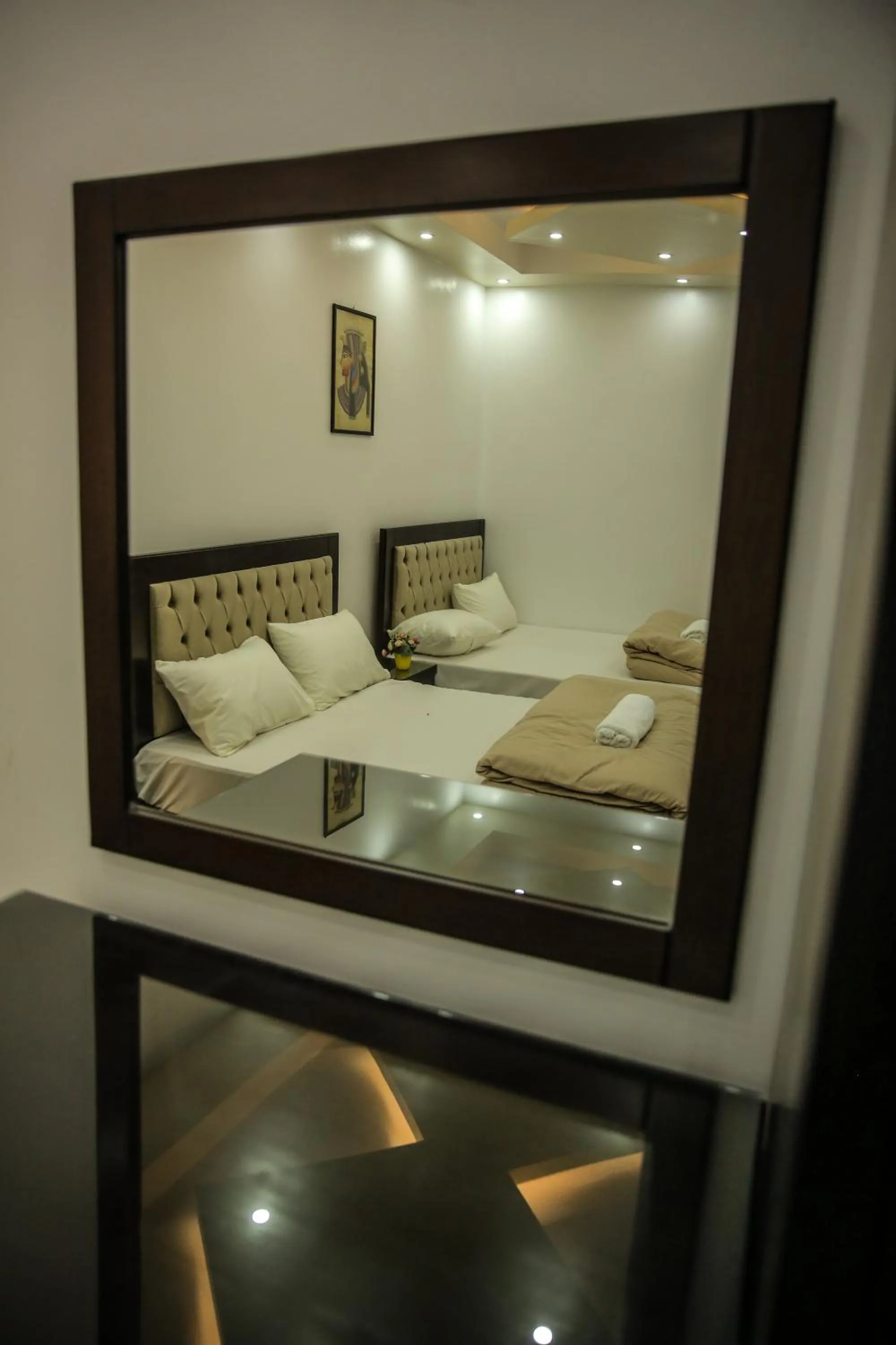 Bed in Queen Pyramids View Inn