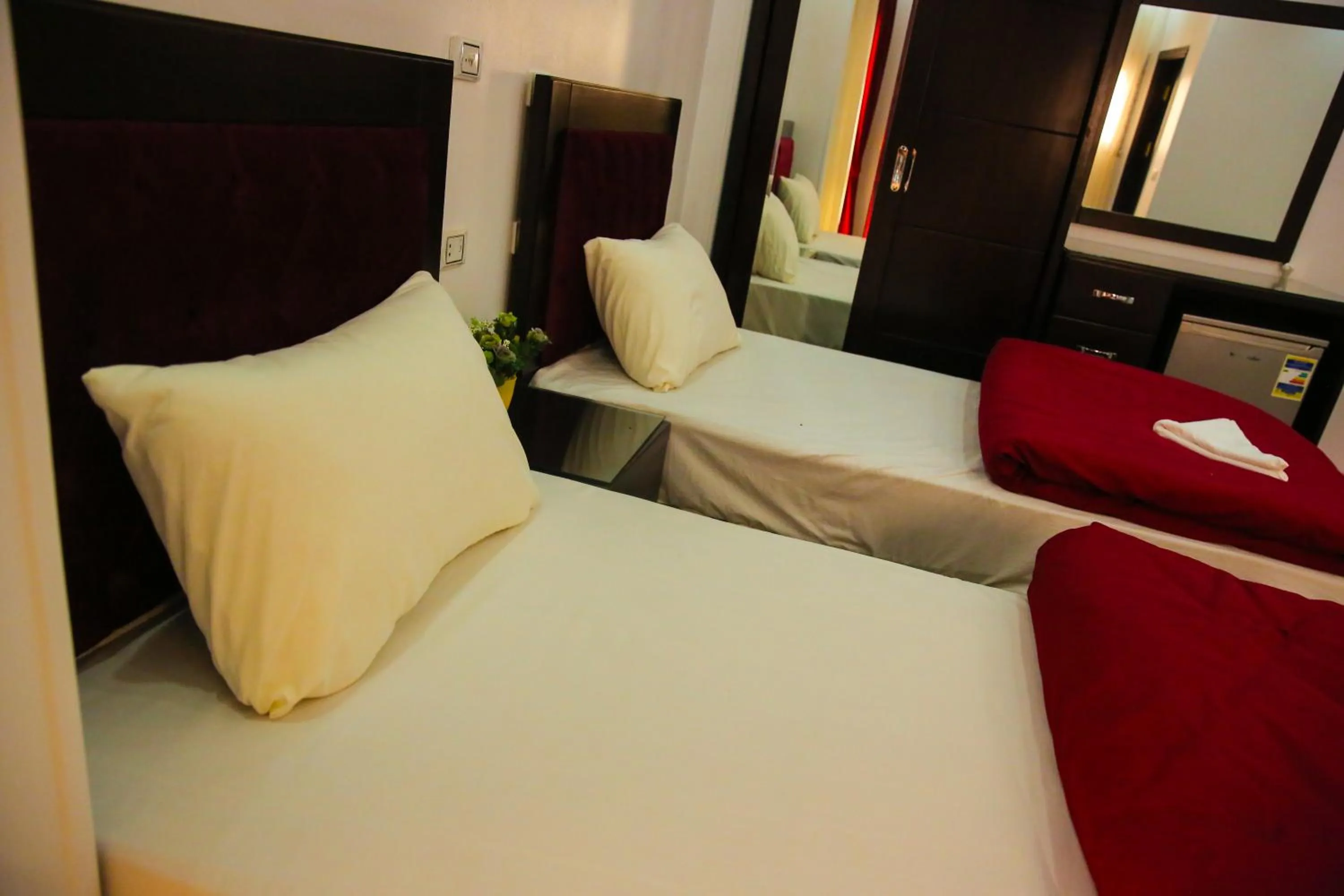 Bed in Queen Pyramids View Inn