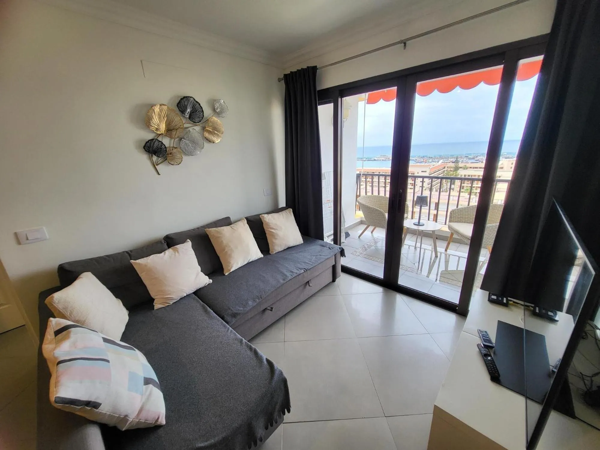Communal lounge/ TV room, Bed in Achacay