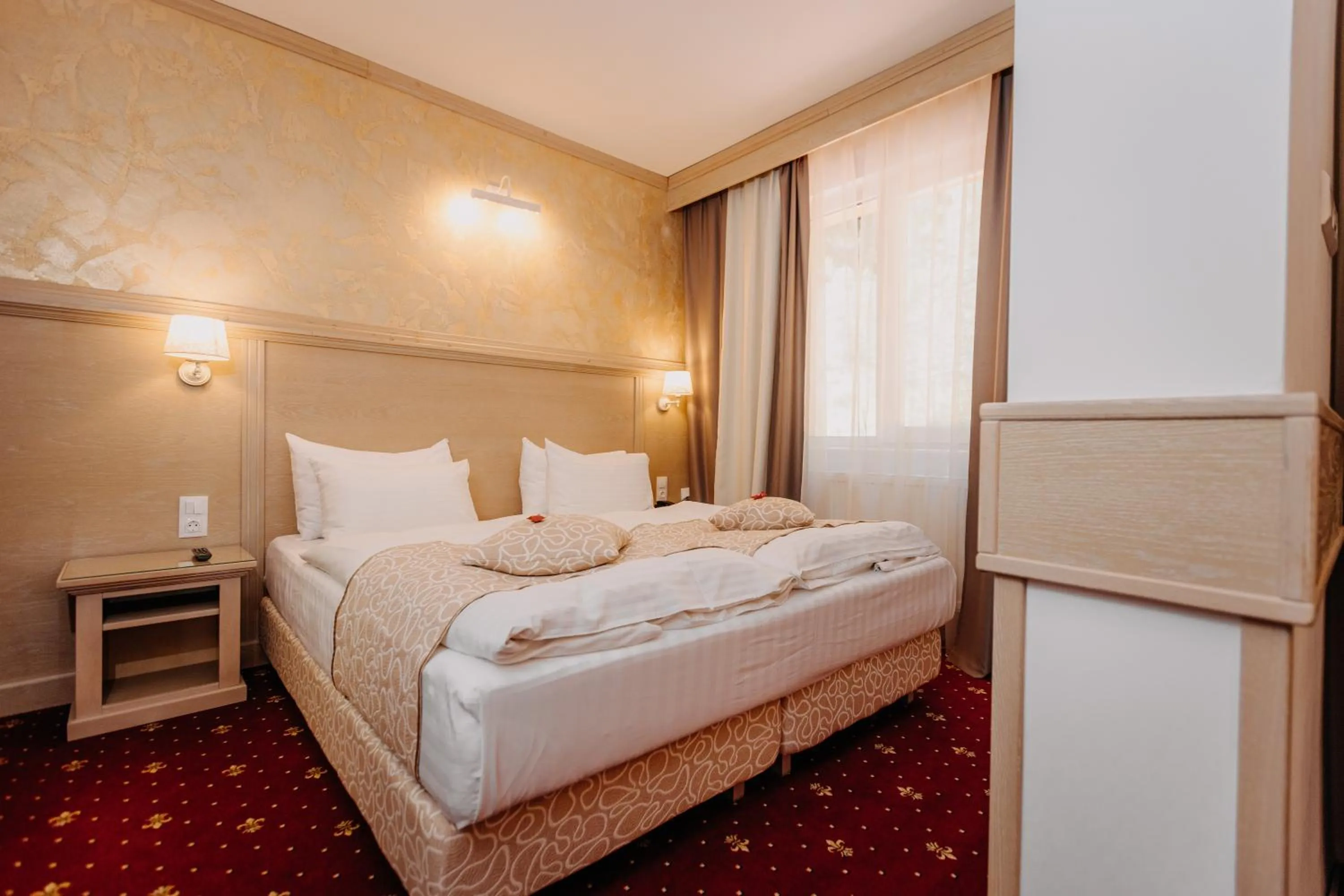 Bed in Hotel Lacu Rosu