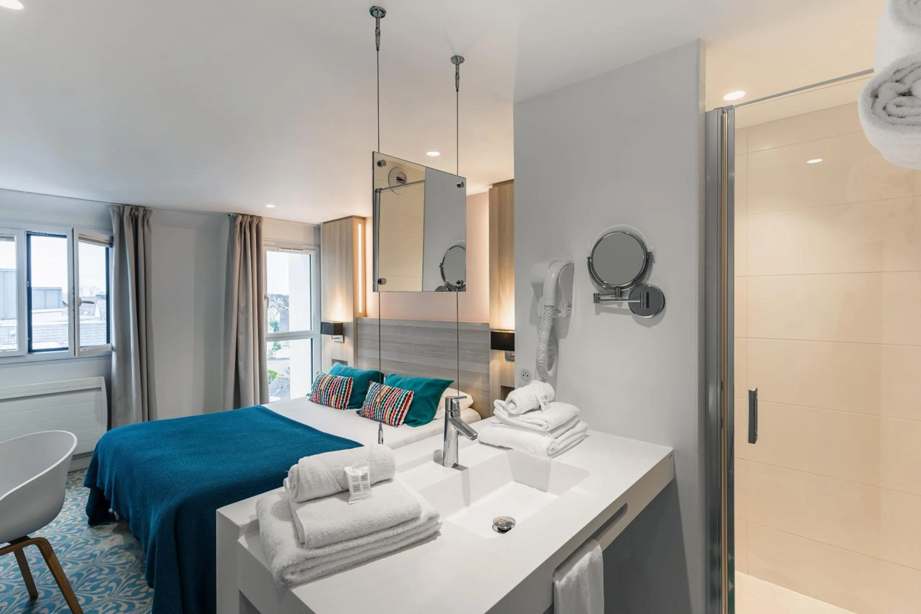 Bed in Le Cornouaille Hotel & Spa