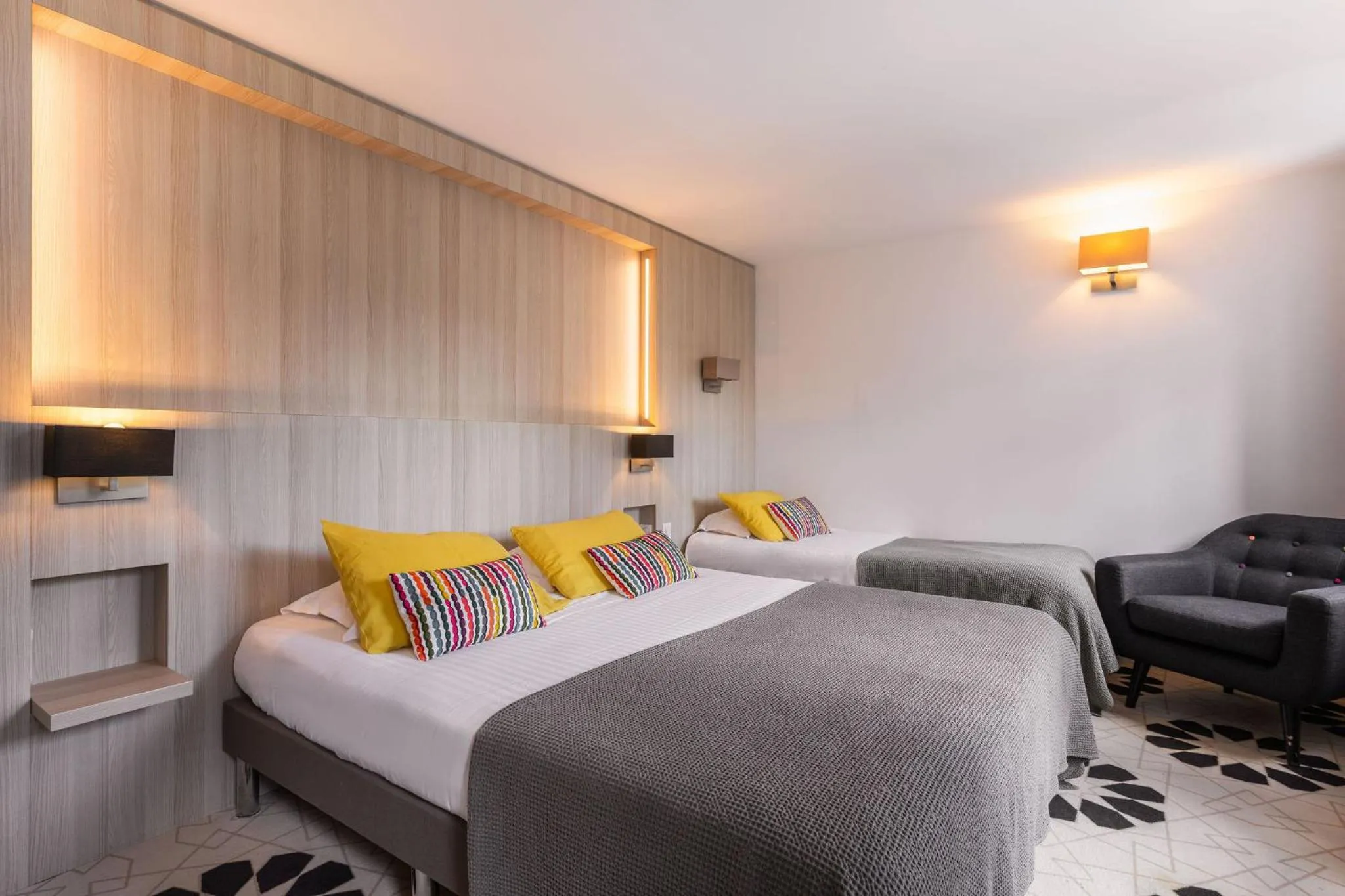 Bed in Le Cornouaille Hotel & Spa
