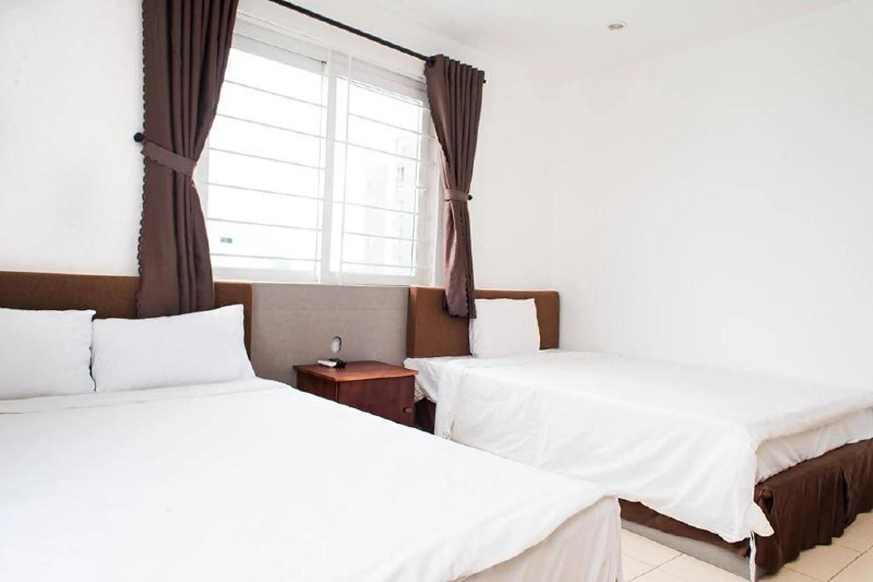 Bed in Catinal Hotel