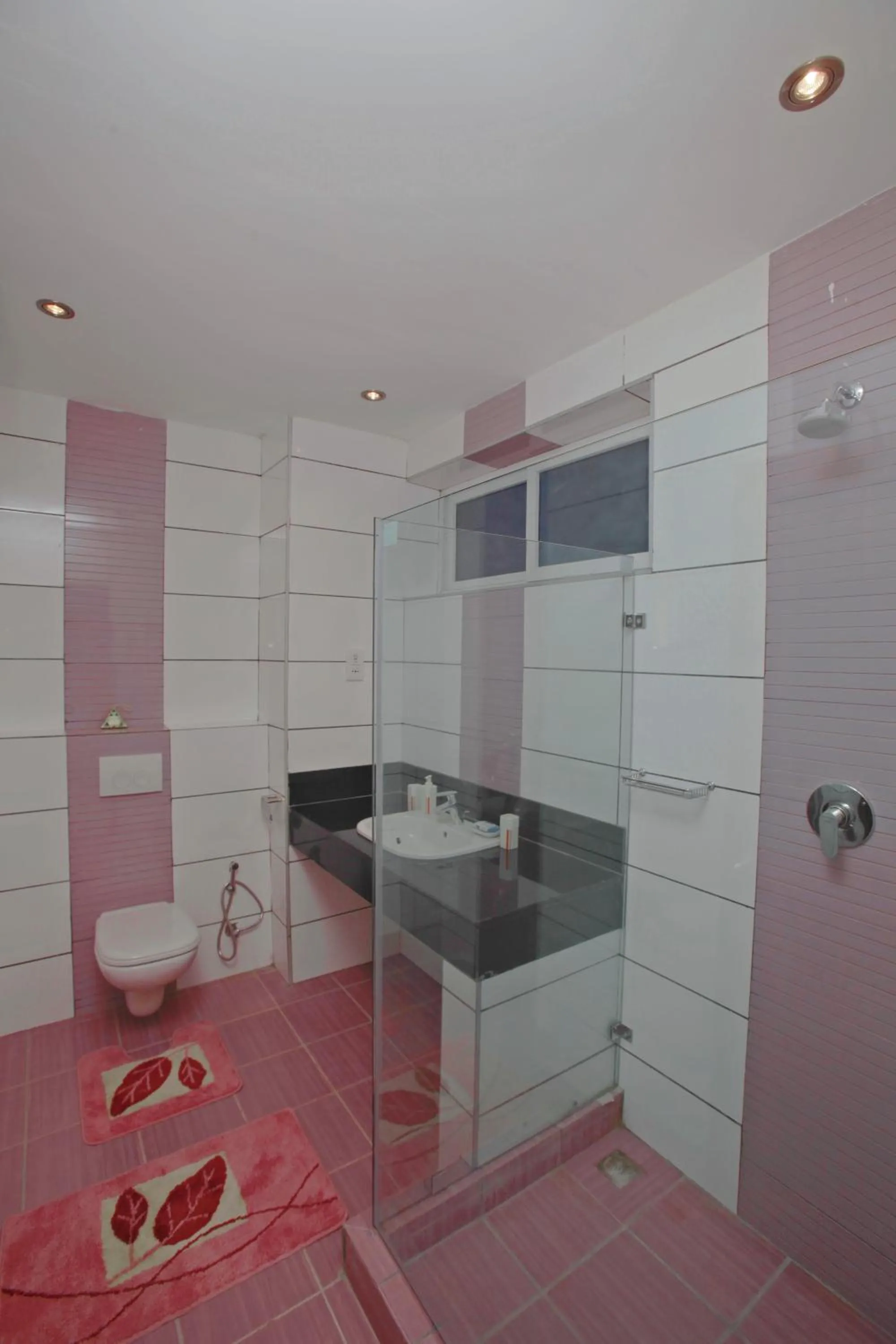 Bathroom in Cowrie Shell Beach Apartments Official
