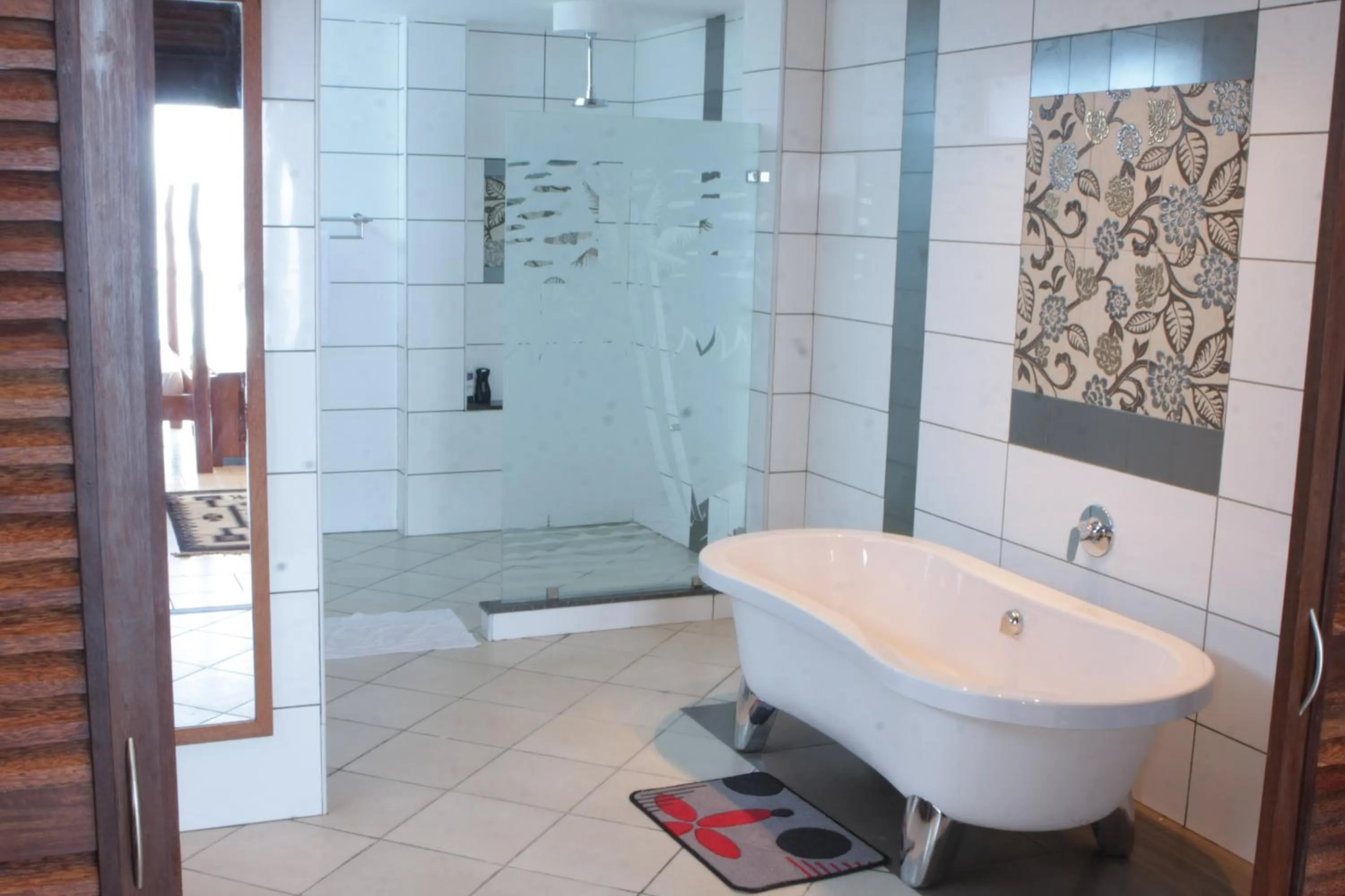 Shower in Cowrie Shell Beach Apartments Official