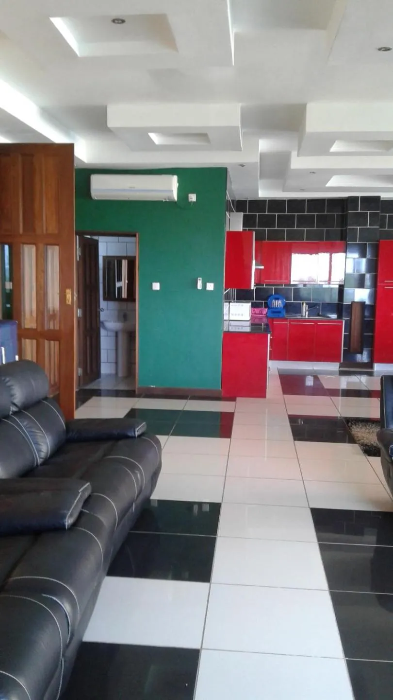 Seating area in Cowrie Shell Beach Apartments Official