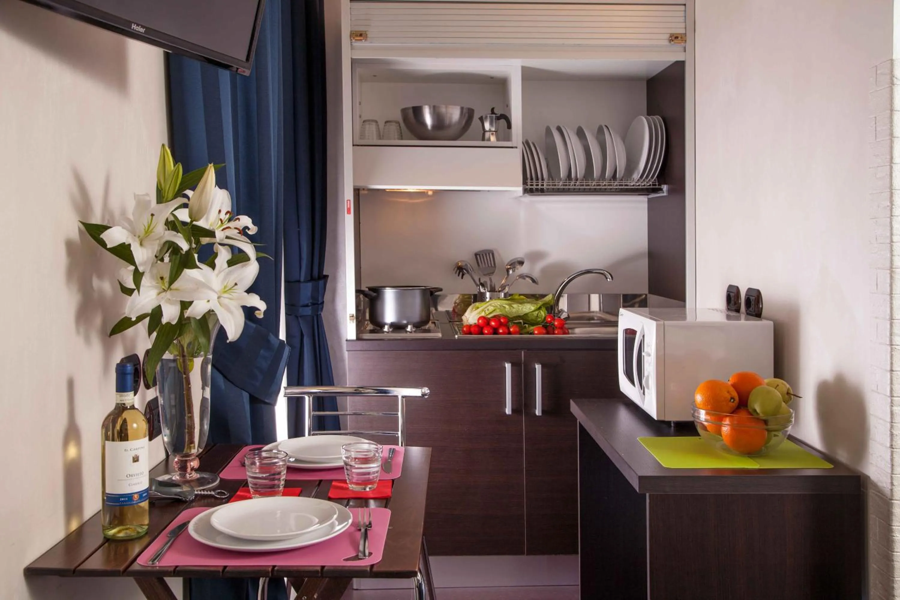 Kitchen or kitchenette in Residenza Dorò- 24x7 Check-in