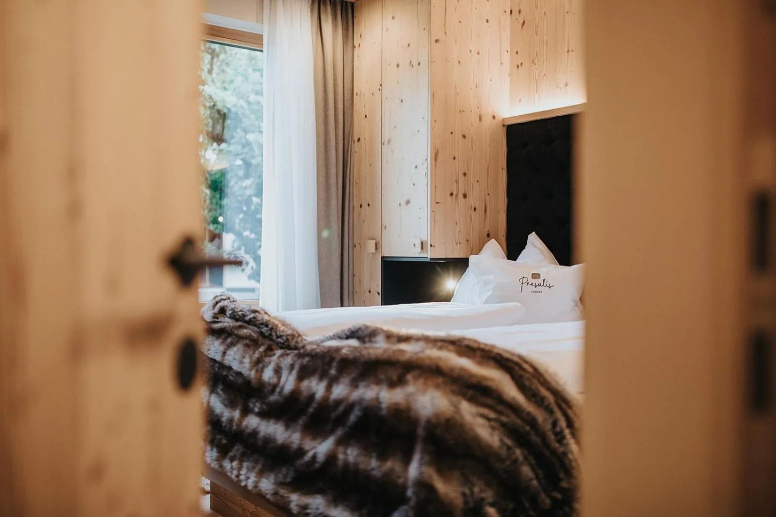 Bed in Presulis Hideaway Apartments & Restaurant