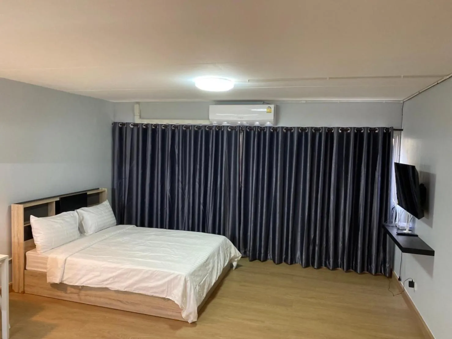 Communal lounge/ TV room in Bangkok Impact Popular Comdominium