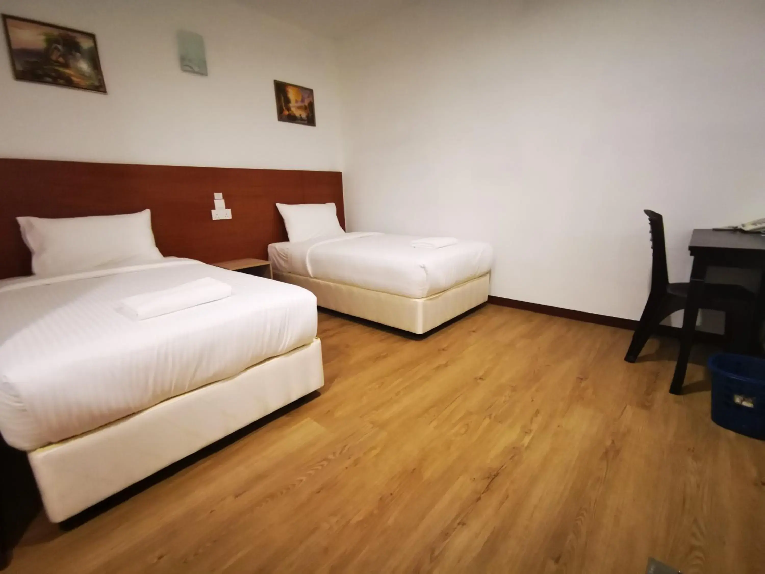 Bed in Amanjaya Hotel Bed in Amanjaya Hotel