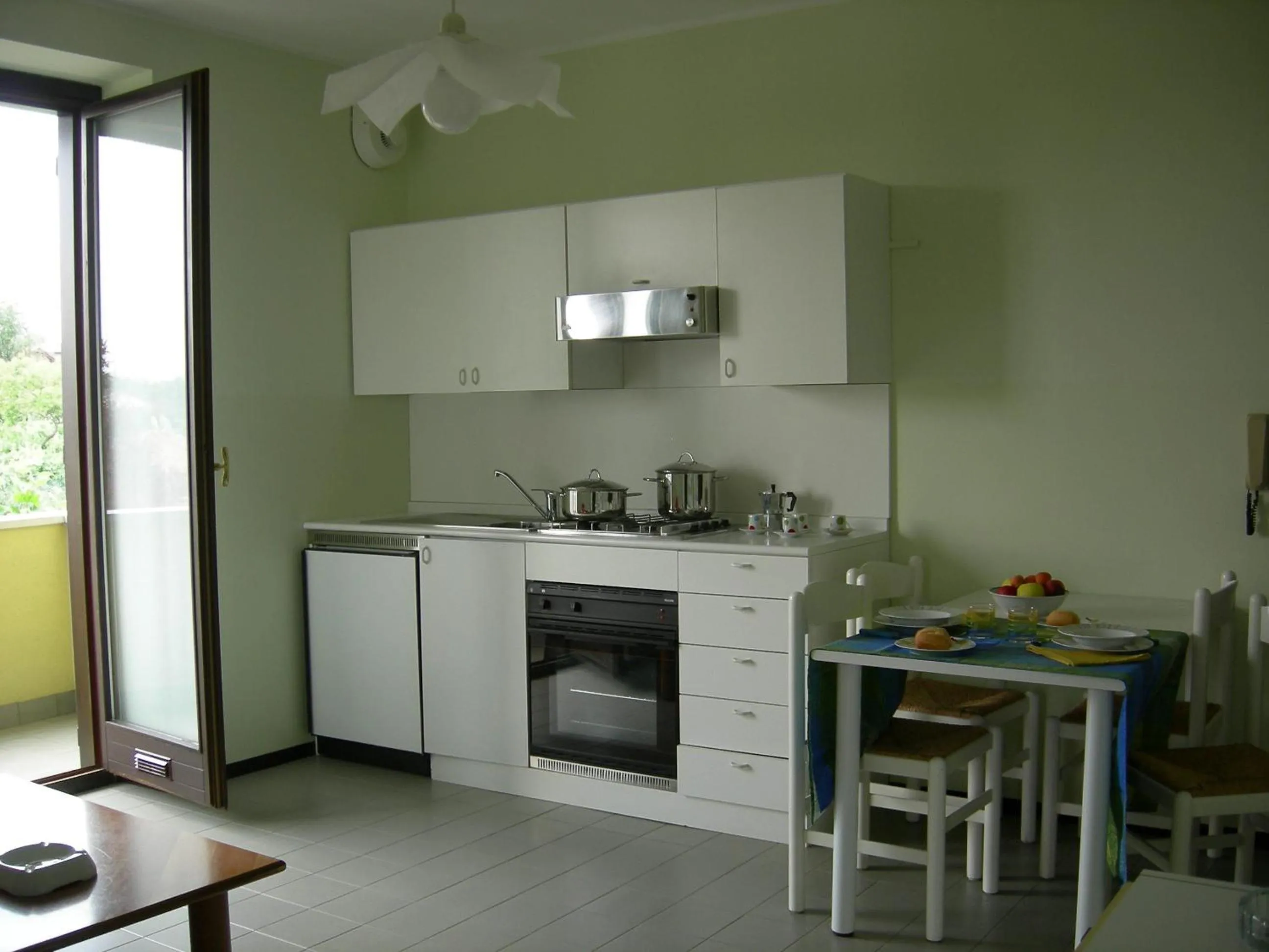 Kitchen or kitchenette in Albergo Residence Isotta