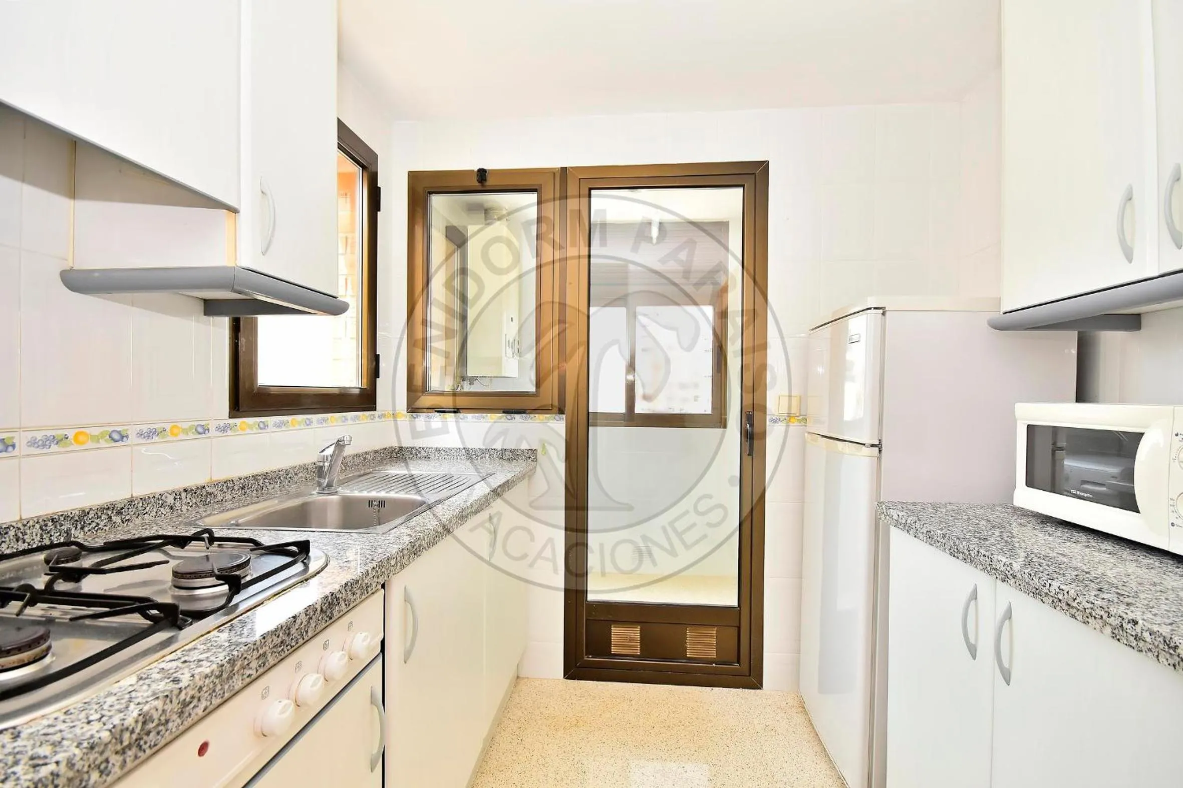 Kitchen or kitchenette in Apartamentos Paraíso Centro - BenidormParaíso