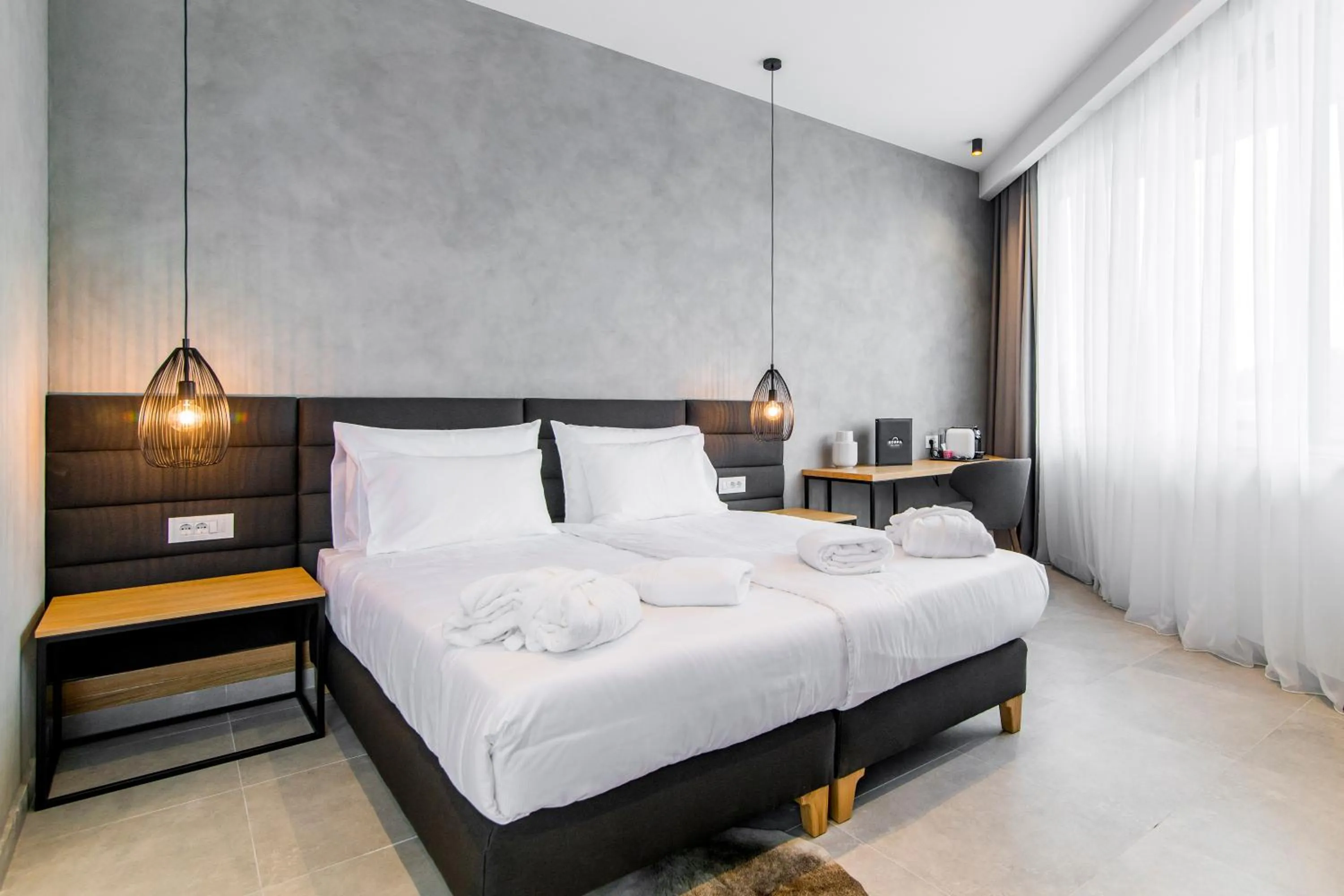 Bed in Korpa Deli Rooms