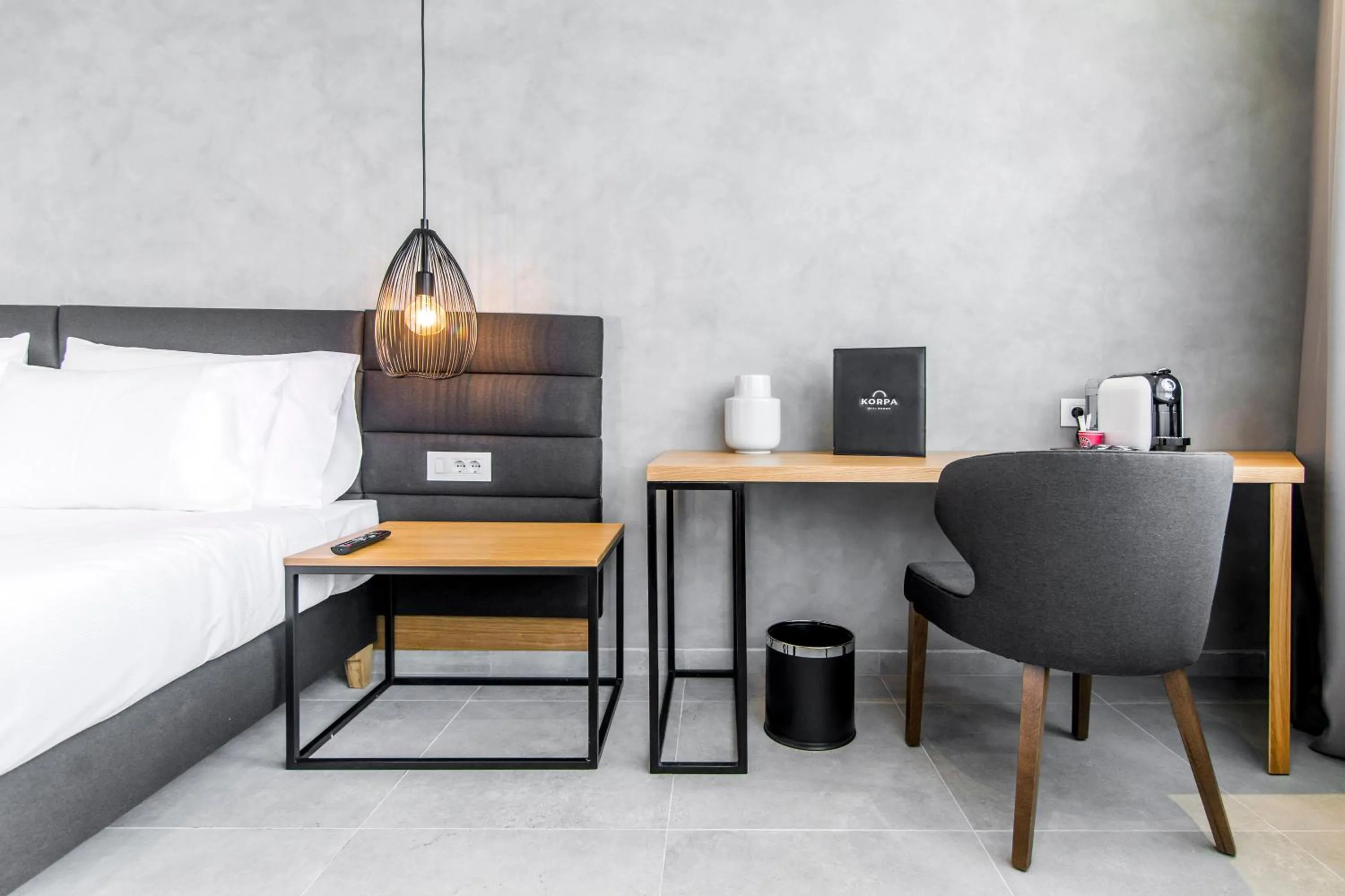 Bed in Korpa Deli Rooms