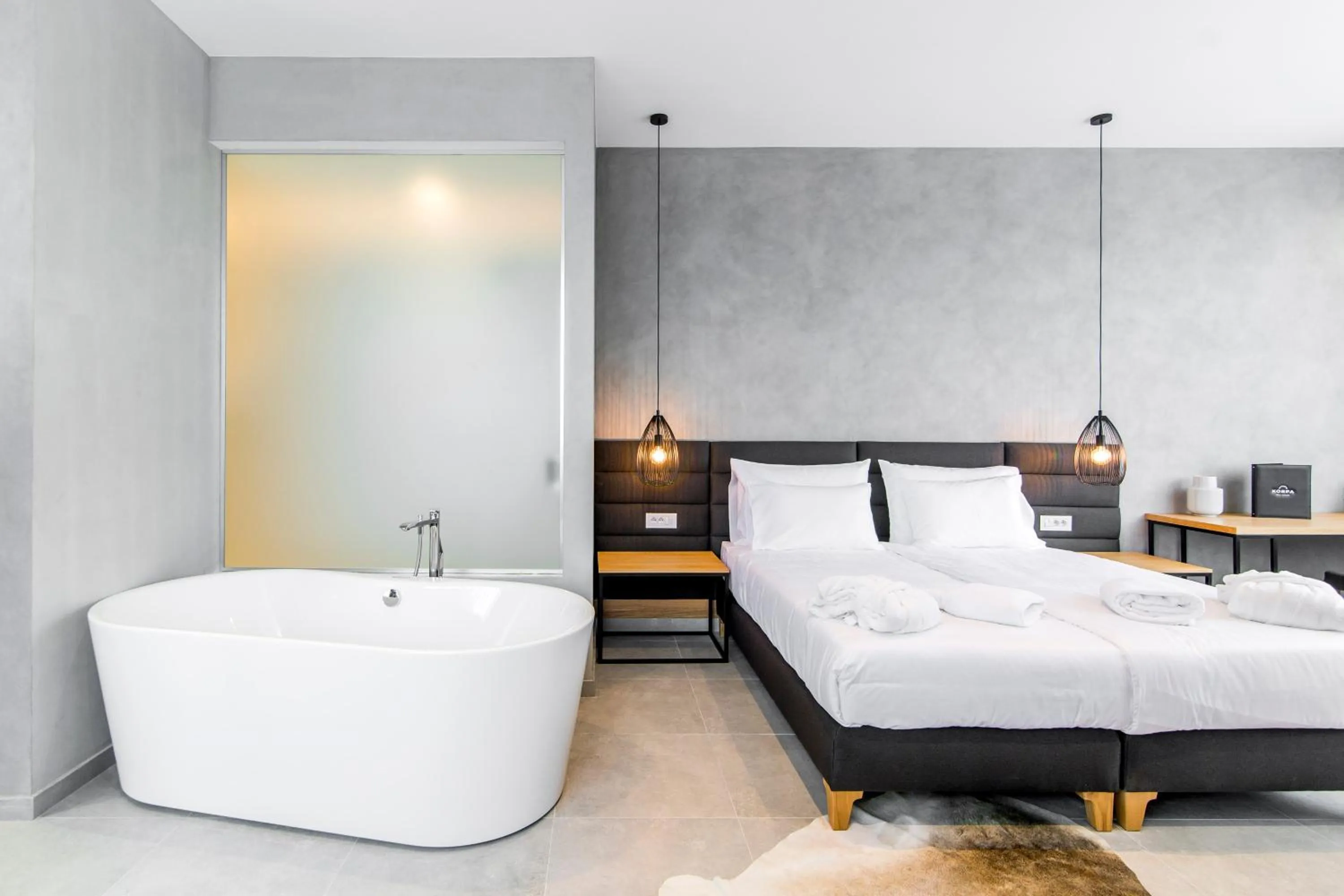 Bed in Korpa Deli Rooms