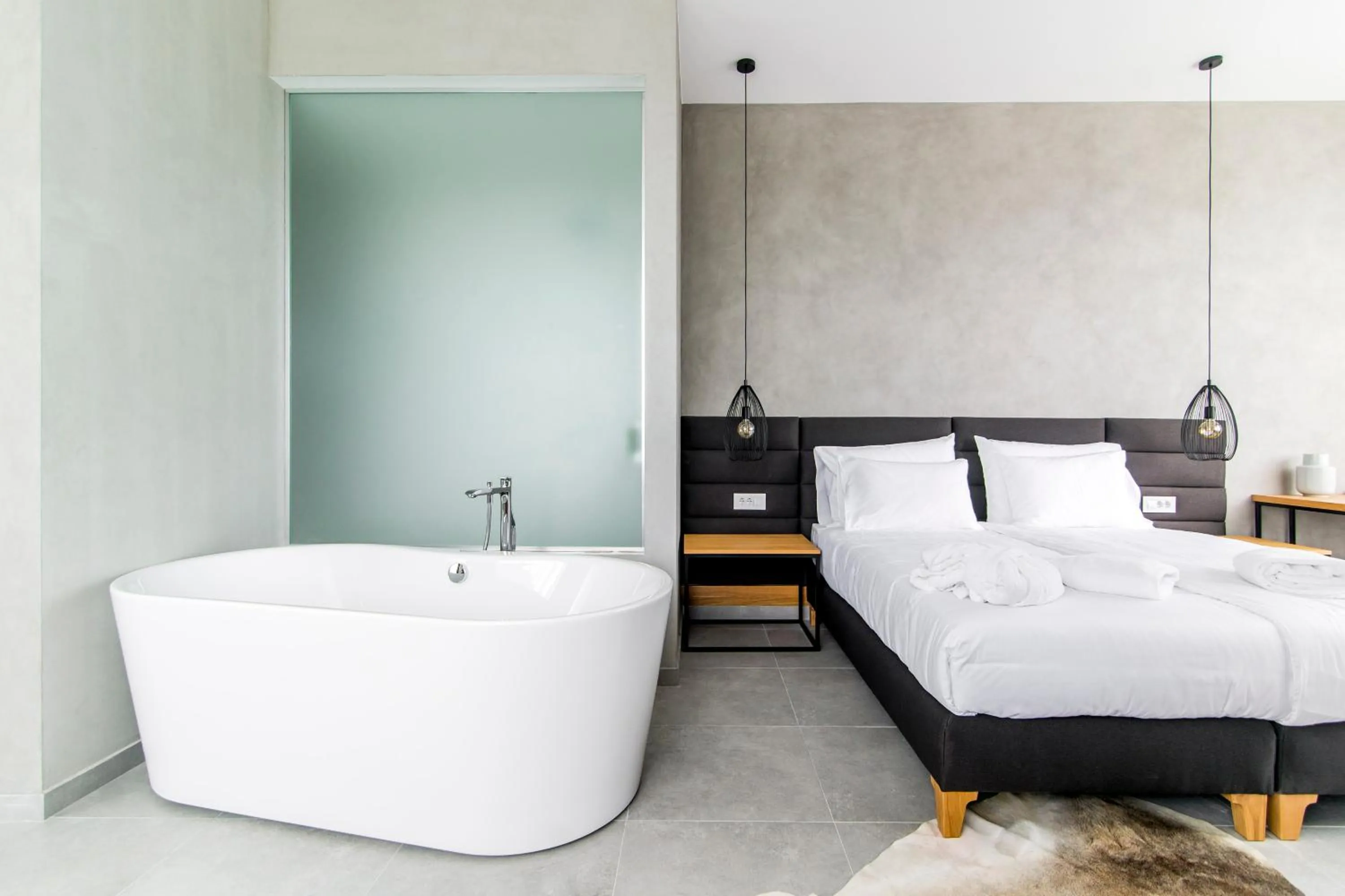 Bed in Korpa Deli Rooms