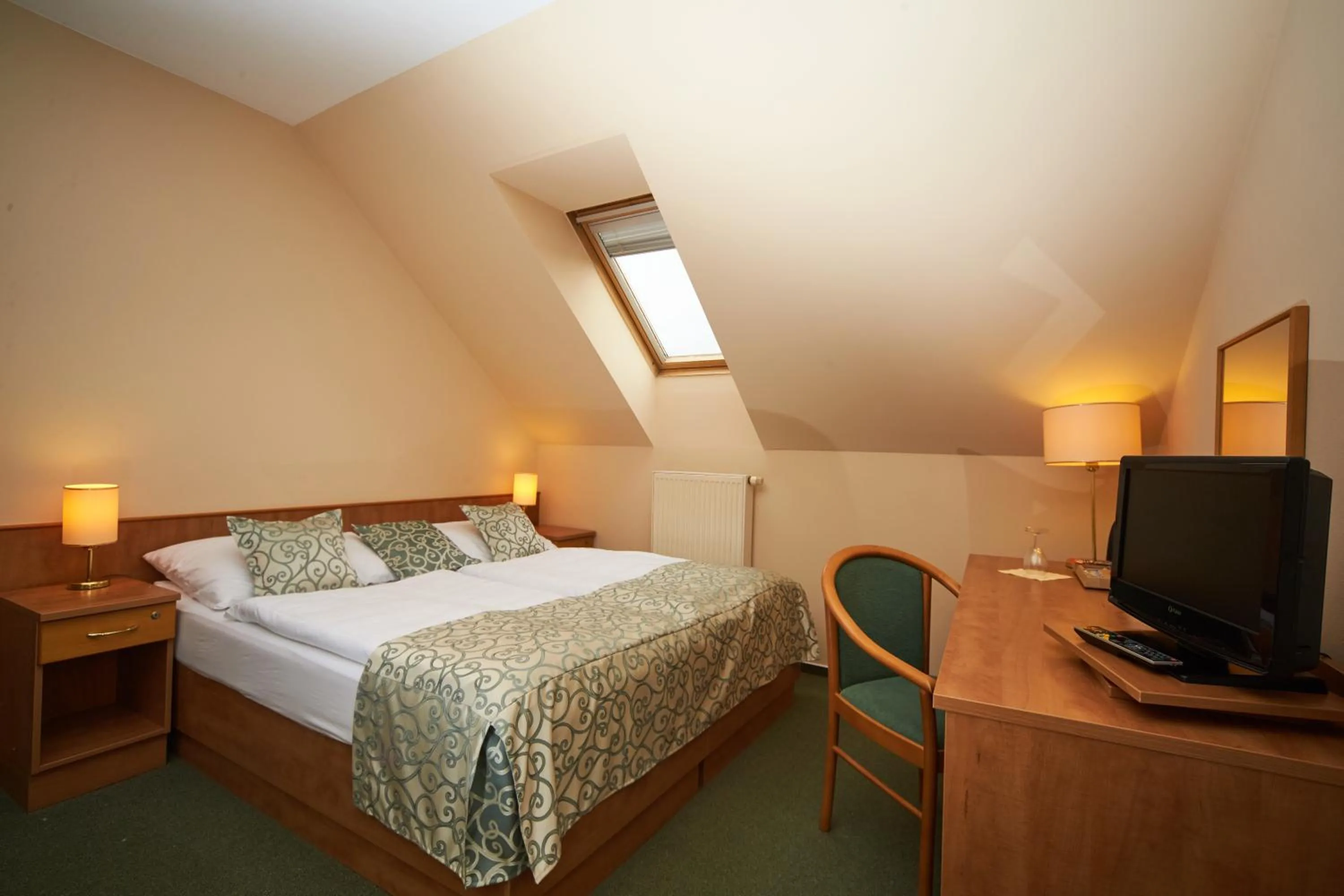 Bed in Hotel Bílý jednorožec