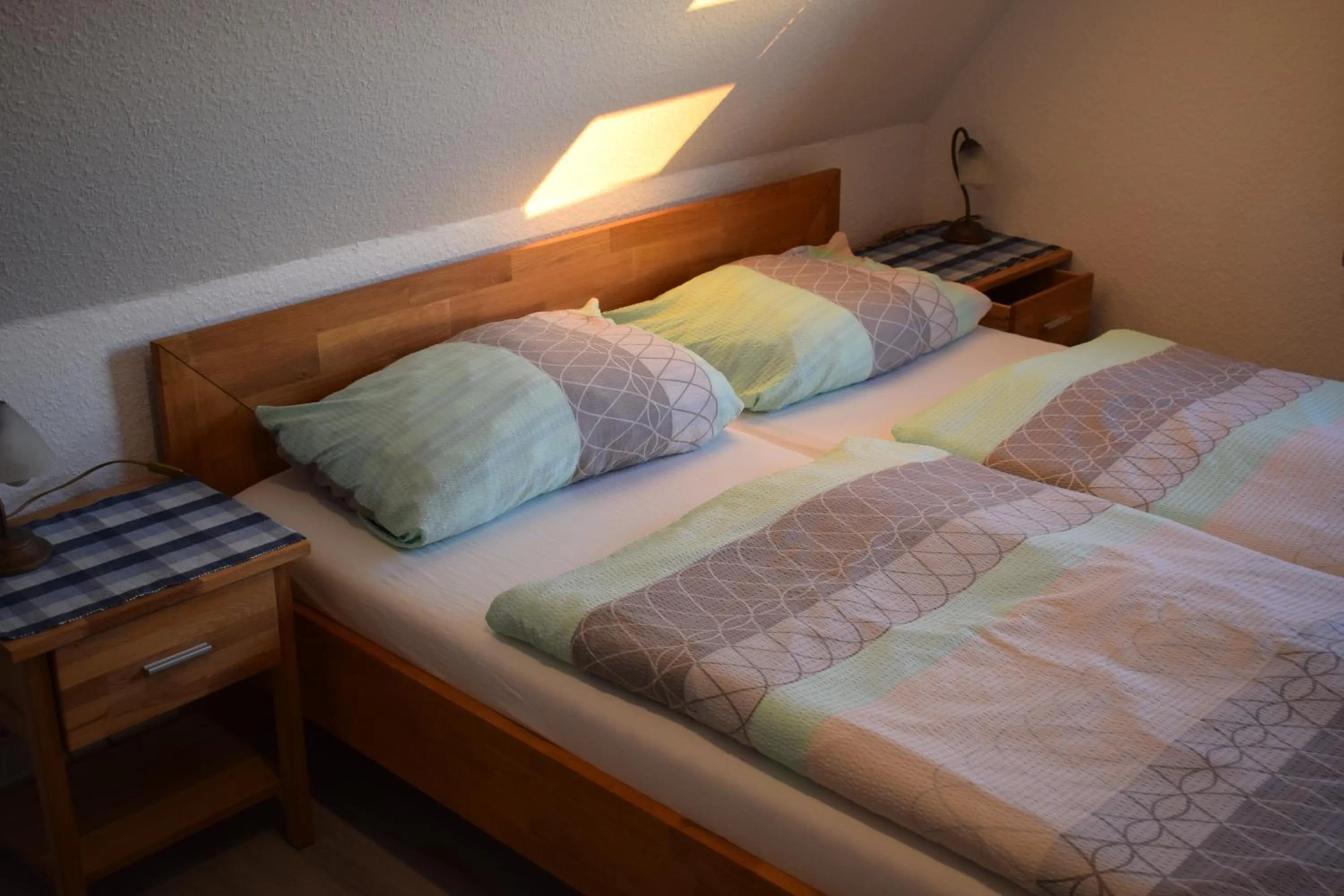 Living room, Bed in Hotel Haus am Meer