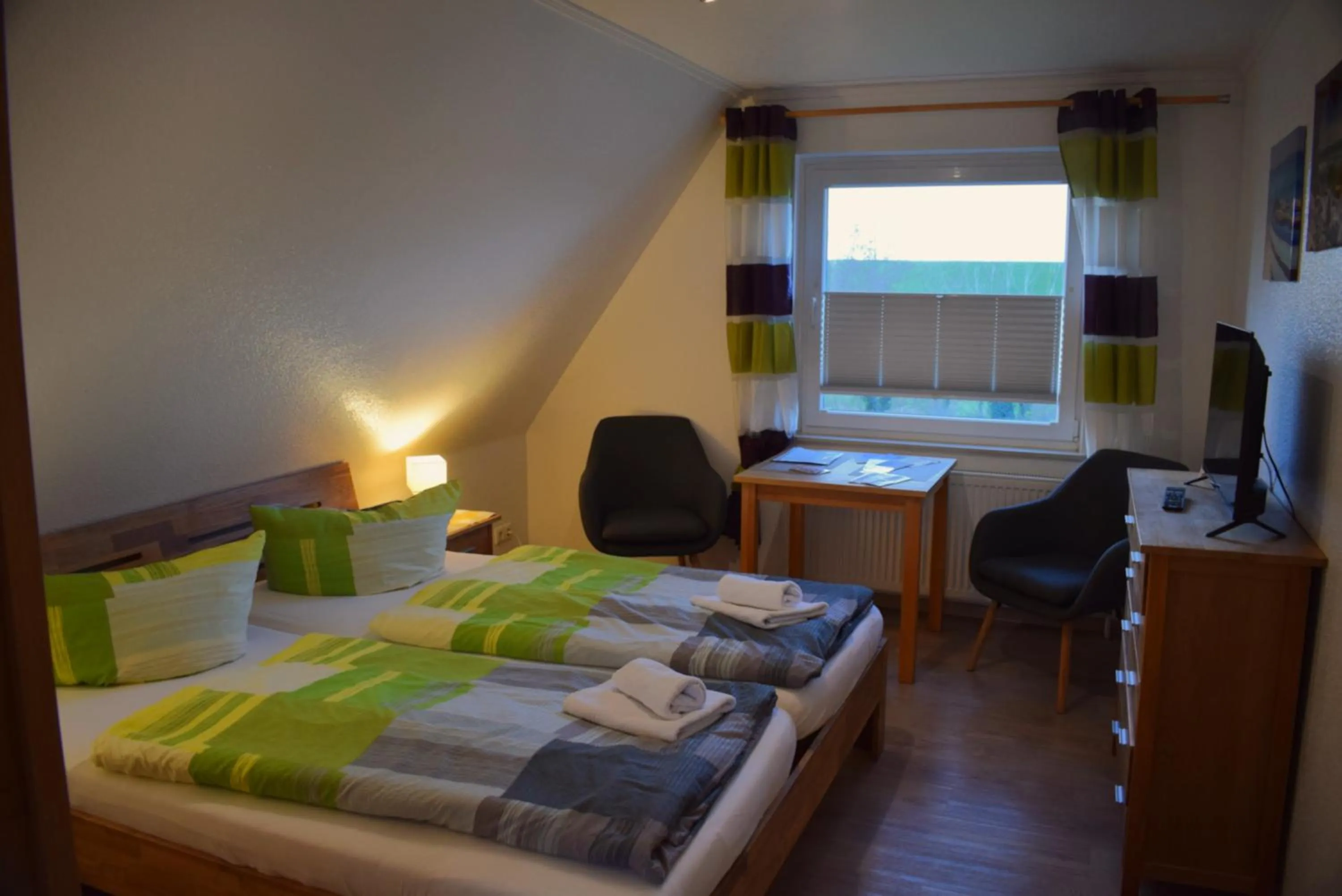 Living room, Bed in Hotel Haus am Meer