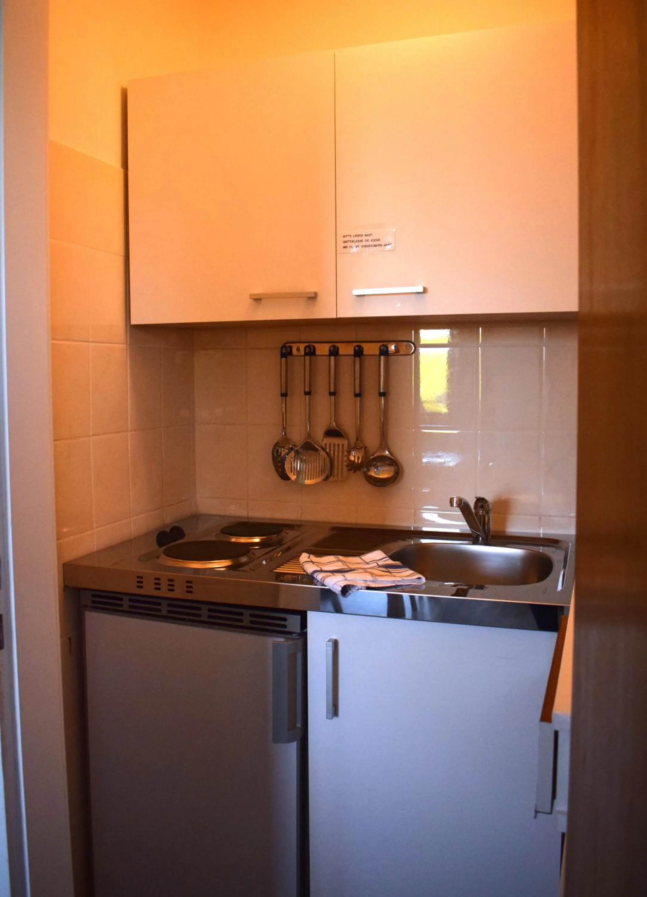 Kitchen or kitchenette in Hotel Haus am Meer